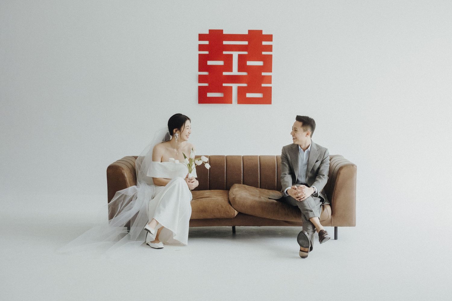 A modern living room scene with a brown leather couch shows six progressive lifestyle moments from left to right.