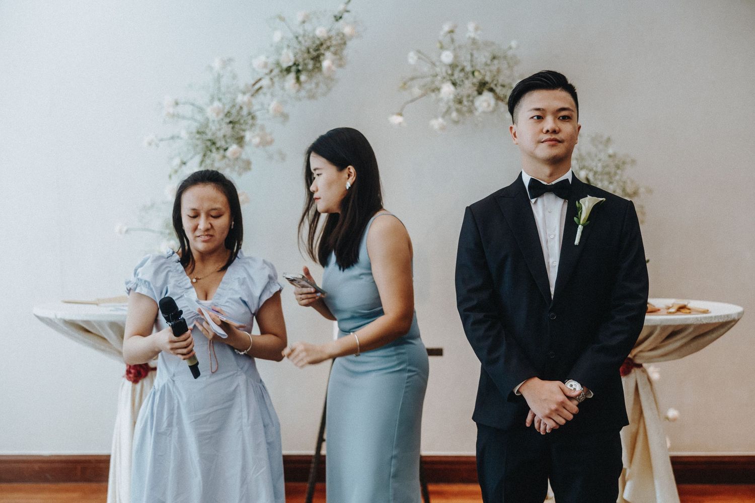 Wedding ceremony candid sequence showing celebrant and couple during an intimate indoor service.
