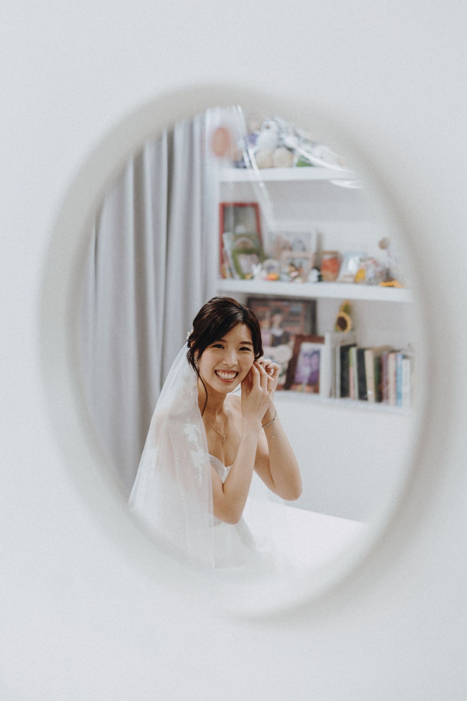 A sequence of bridal preparation photos shown through circular vignettes showing emotions and getting ready moments.