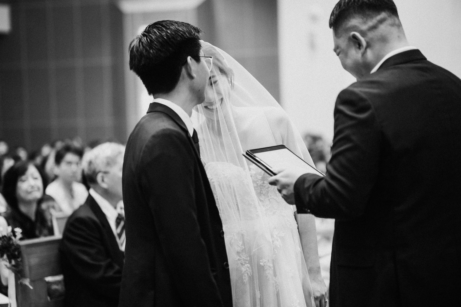 Wedding ceremony photos showing intimate black and white moments during the celebrations.