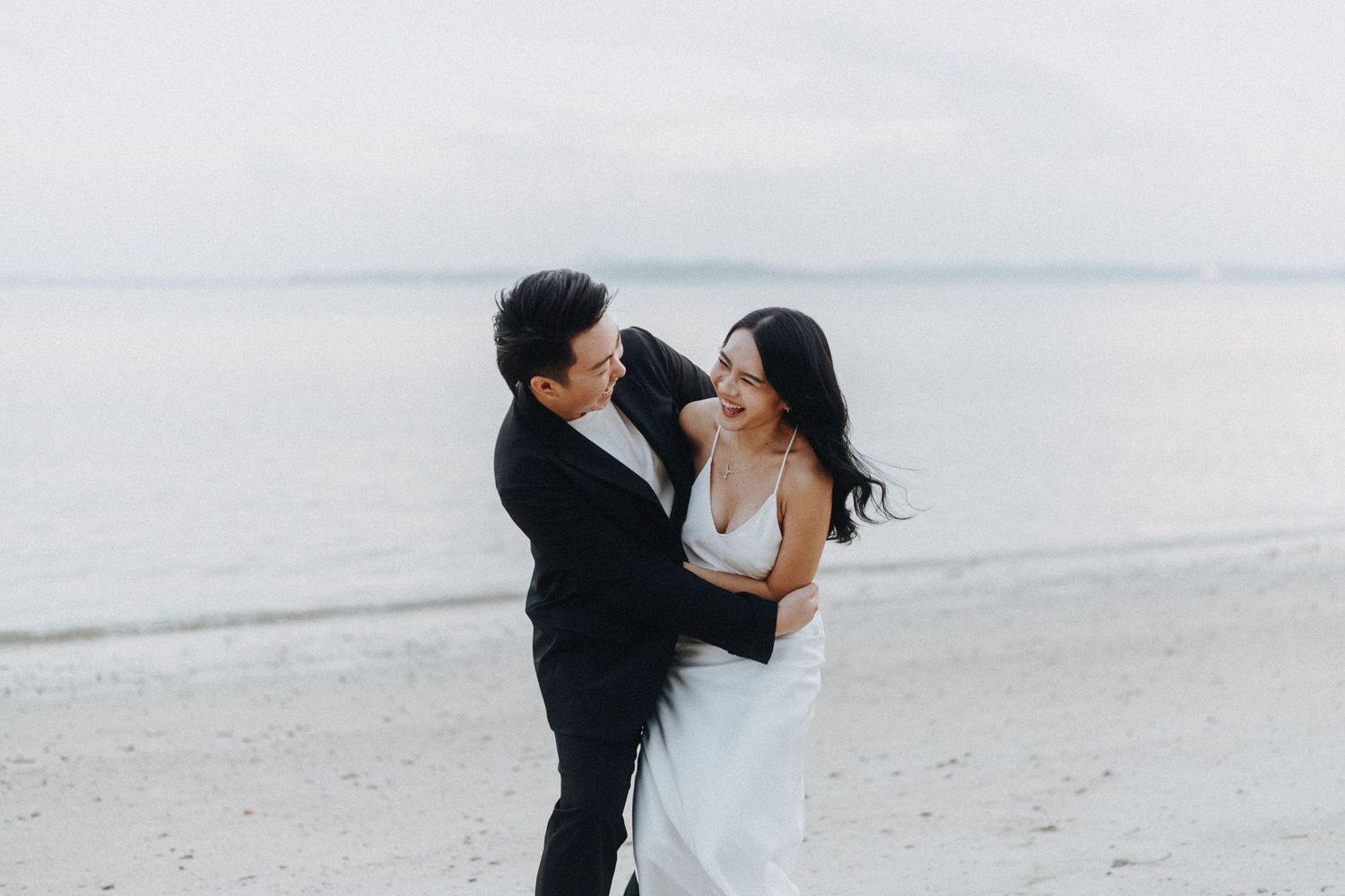 Romantic beachside photography session at sunset.