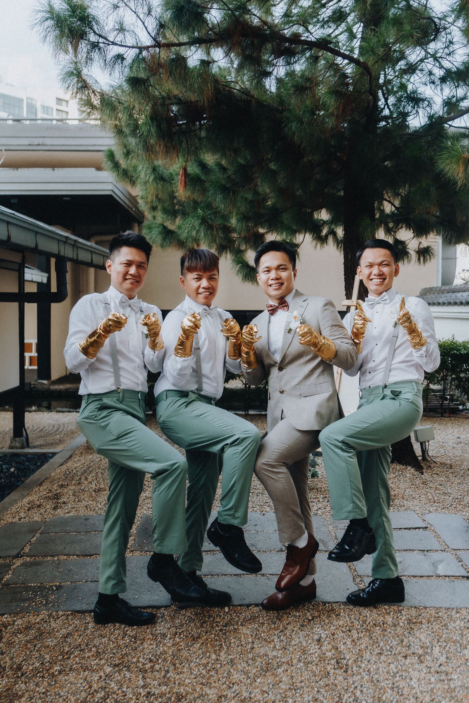 Groomsmen in matching white shirts and green pants perform synchronized high kicks in a playful photo sequence.