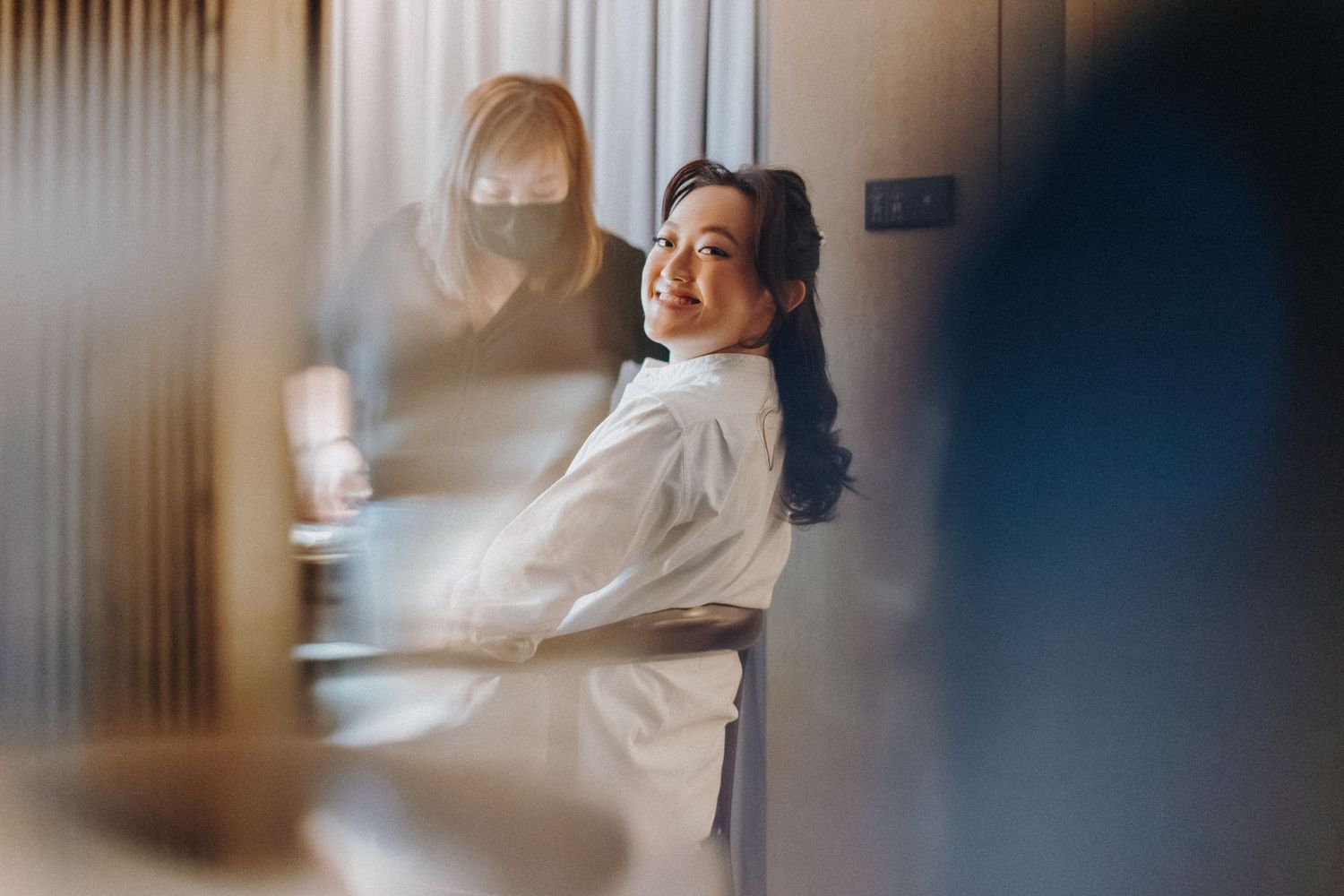 A blurred artistic photo sequence showing ethereal motion and movement in soft, dreamy lighting.