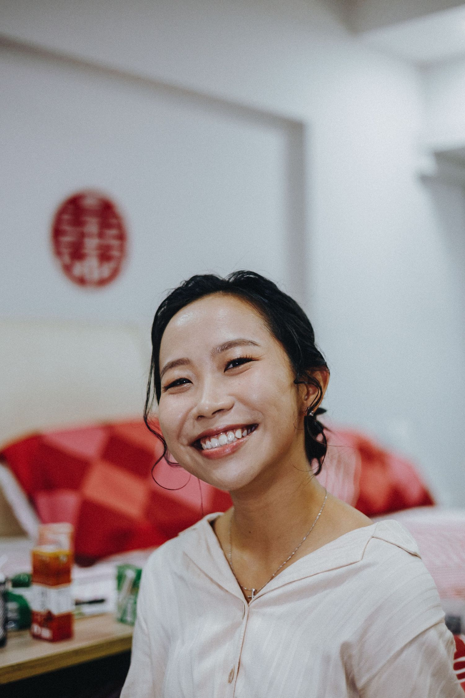 A sequence of joyful expressions in casual dress against a light background.