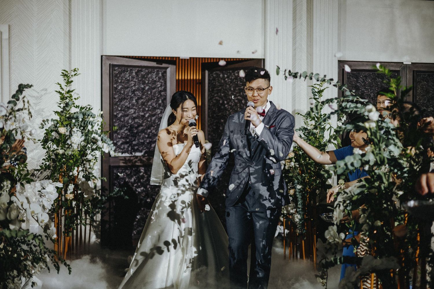 A celebratory moment with confetti during a wedding ceremony.
