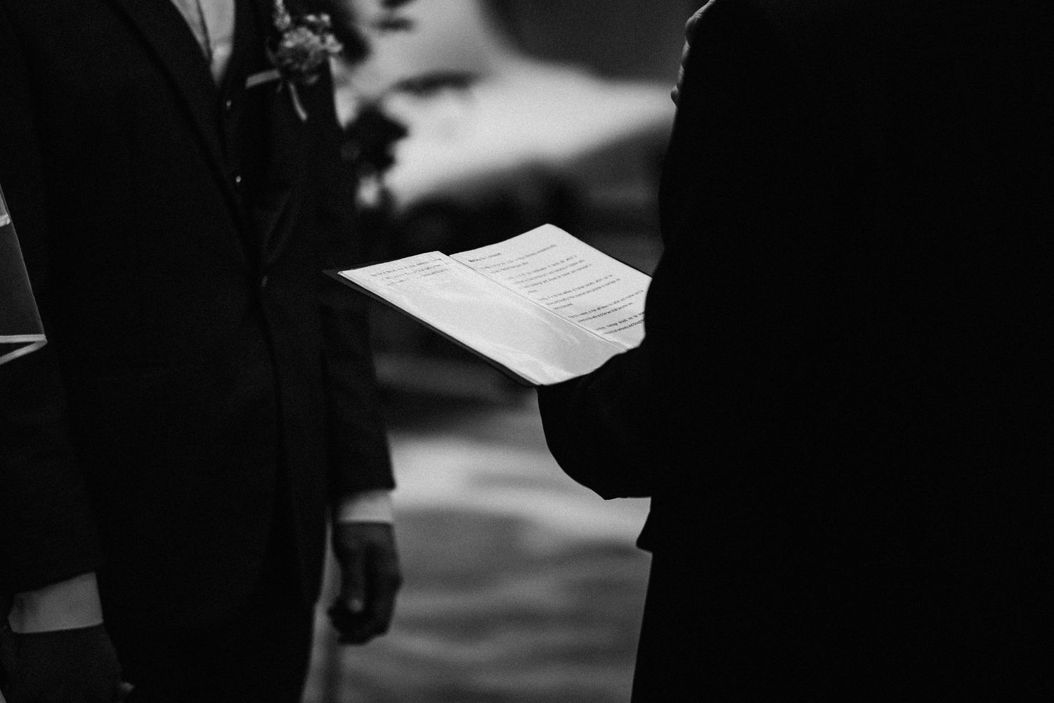 Dark moody silhouettes against bright windows during an event.