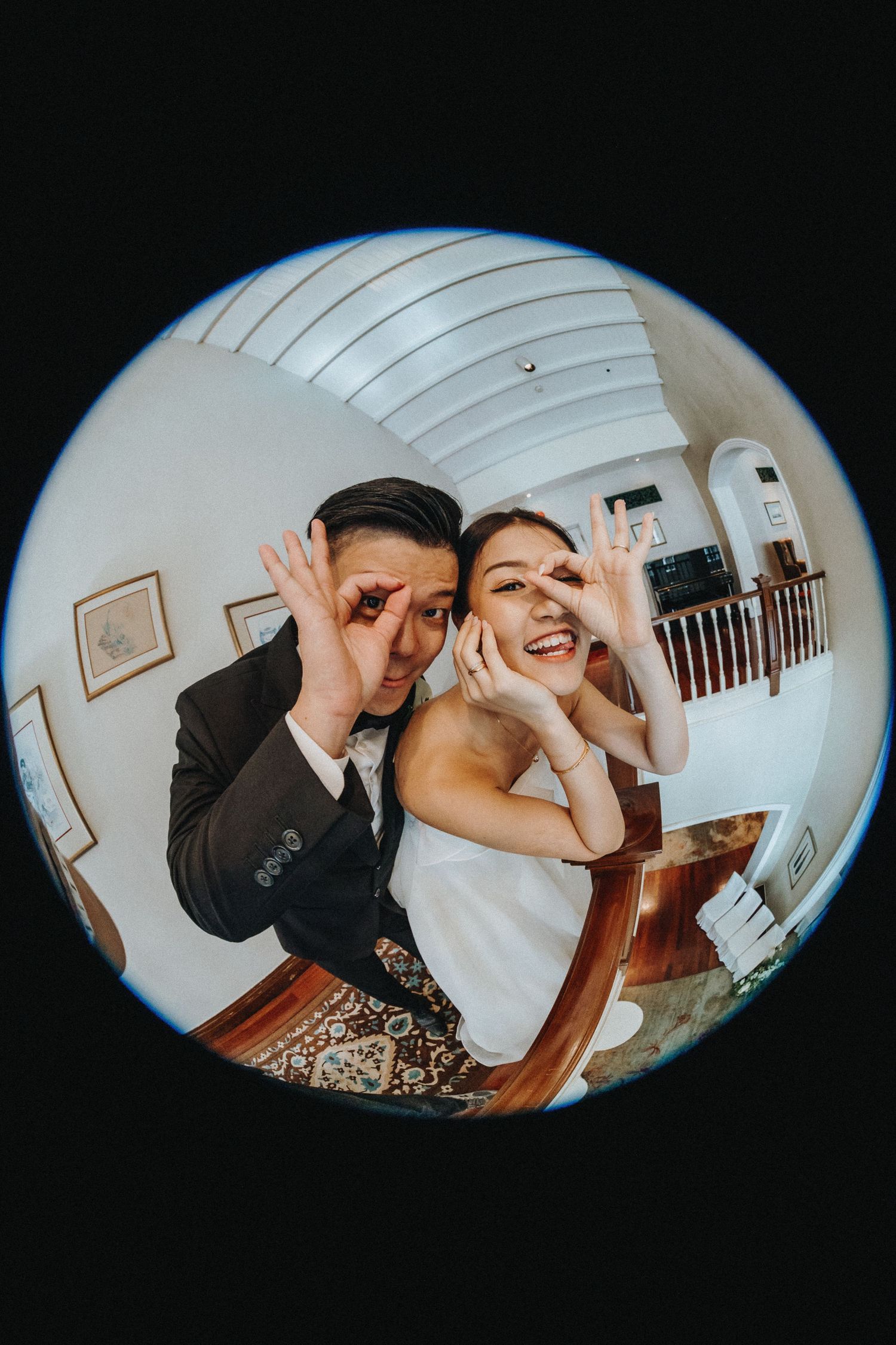 Fisheye lens photos showing playful moments in a home interior.