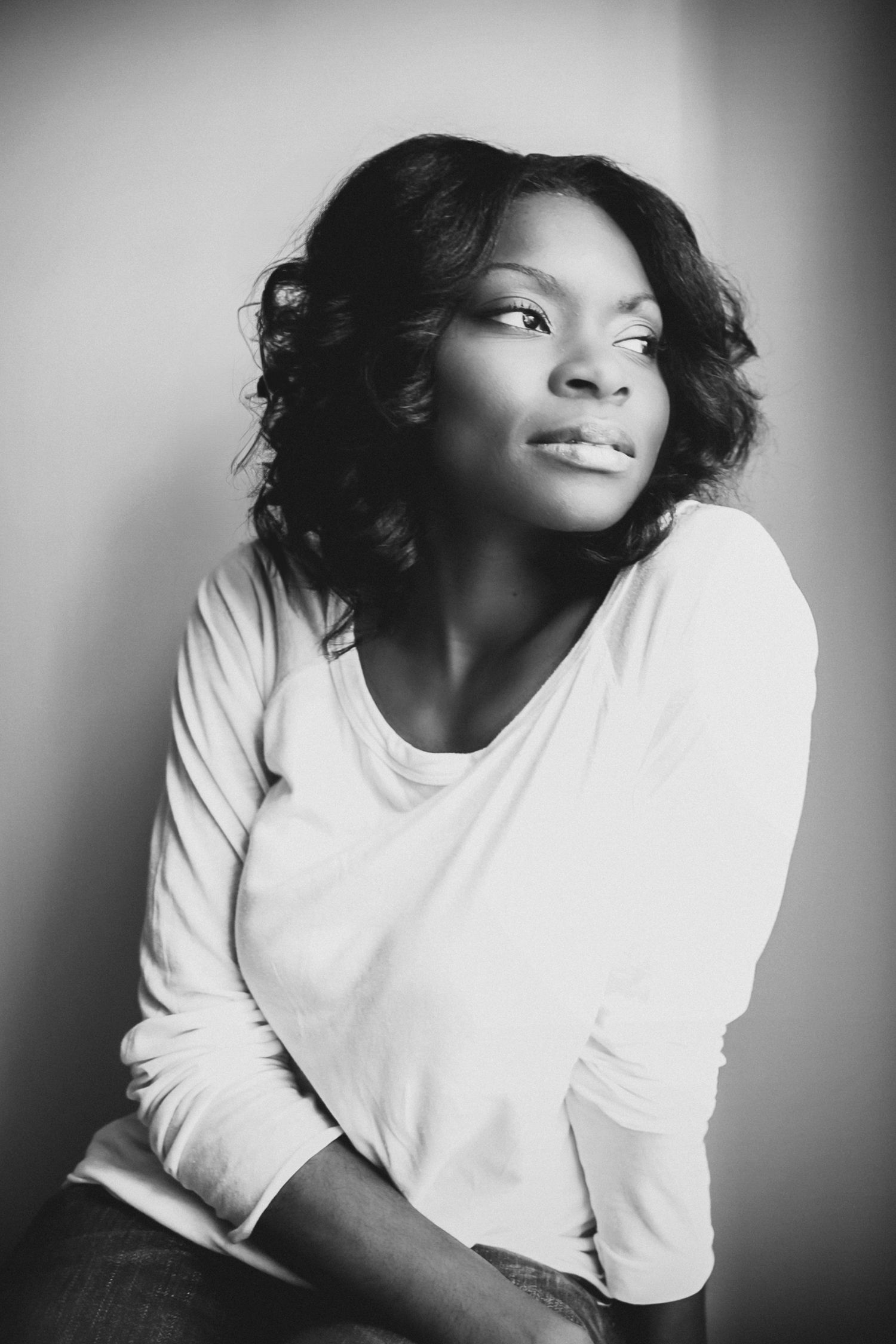 Moody black and white headshot of a creative professional in Charleston South Carolina