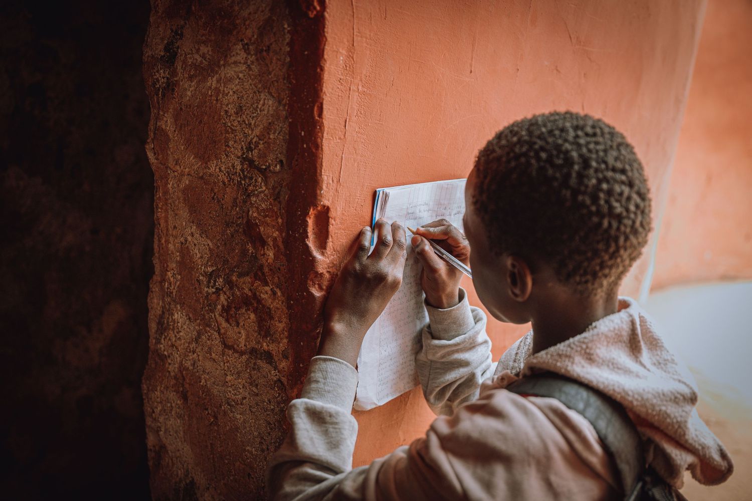 A child doing homework in Dakar, Senegal