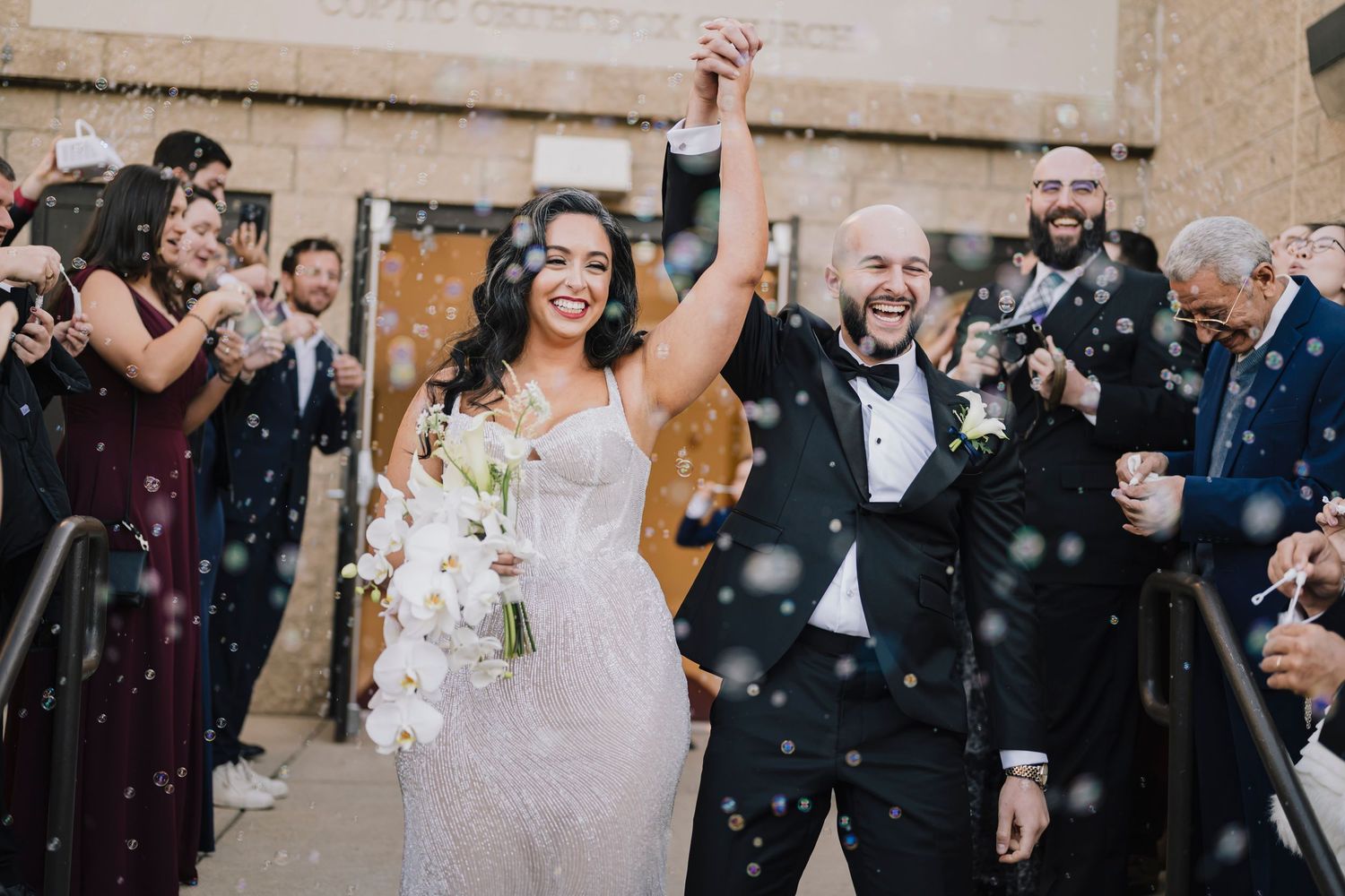 A bride and groom exiting the church on their wedding day