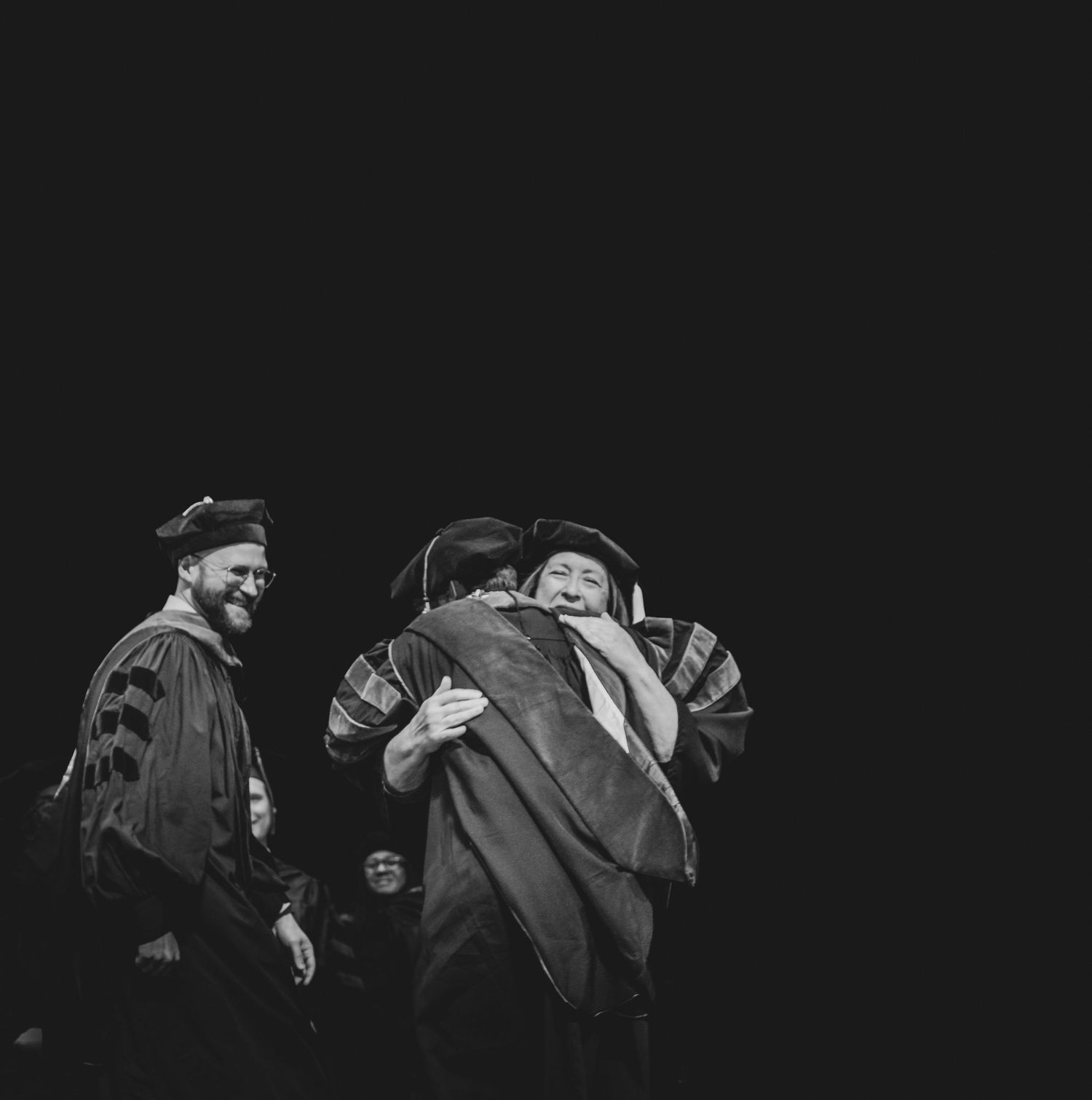 Actors performing an expressive scene on stage with dramatic lighting — theatrical photo byDaviel.com in Tulsa