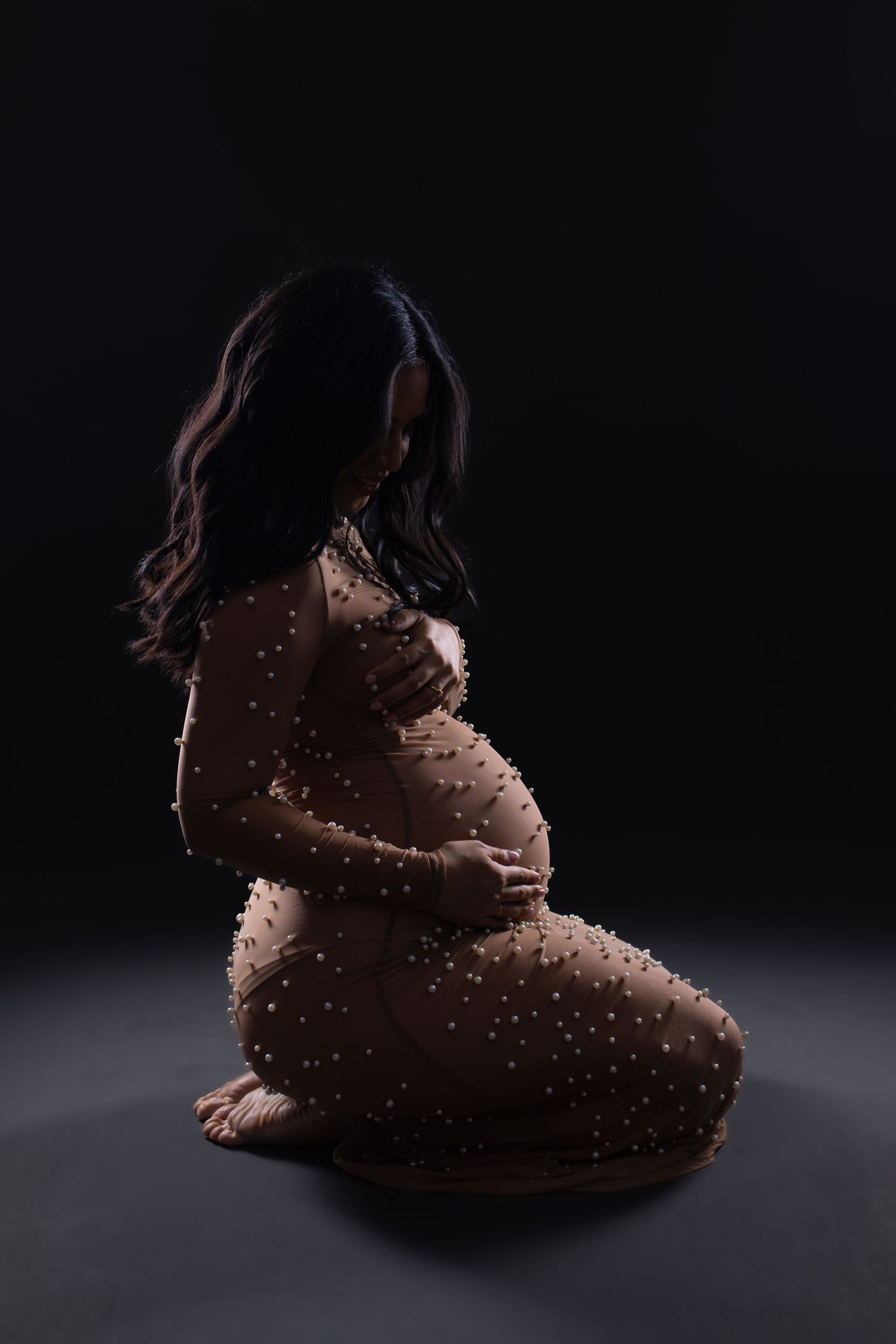 Elegant maternity photography portrait captured in a private Darwin studio by Julie Françoise Imagery