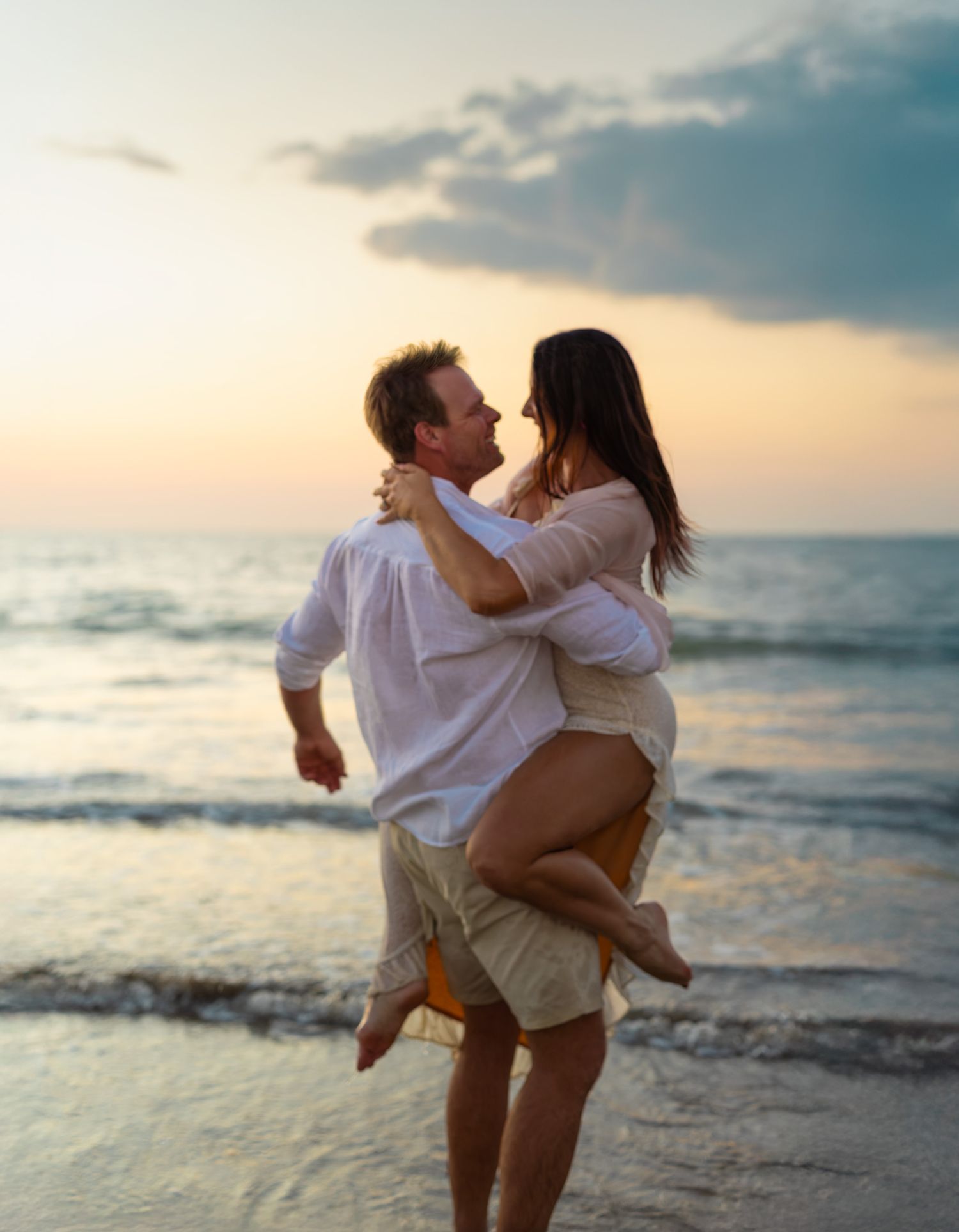 Romantic couples sunset beach photography session in Darwin captured by Julie Françoise Imagery