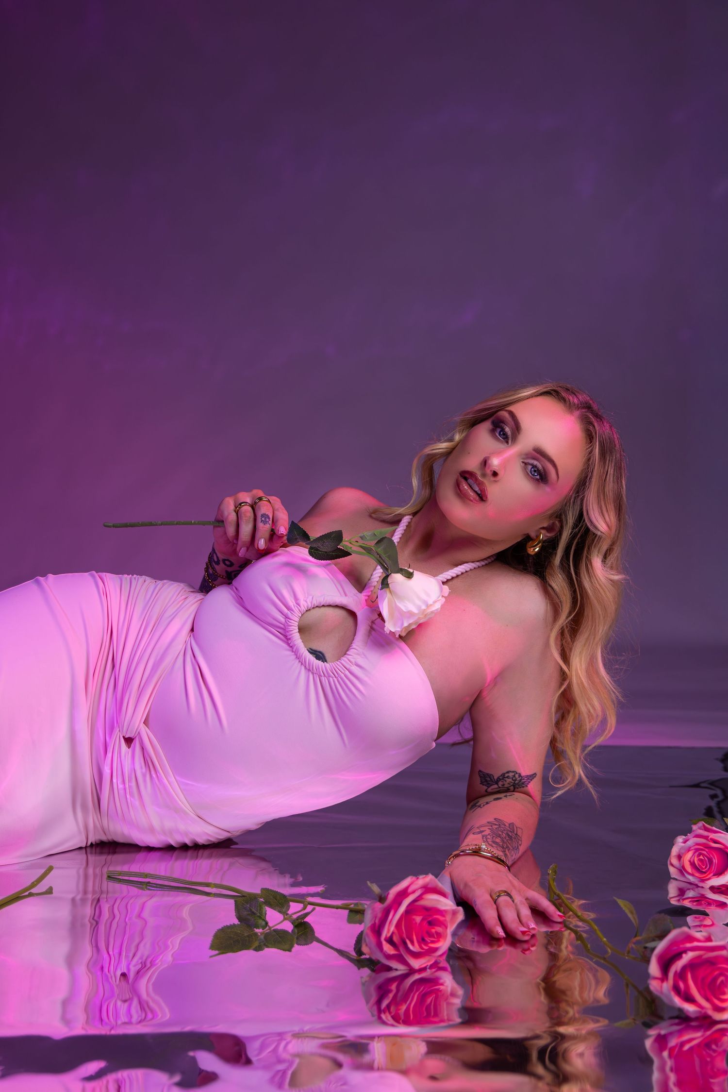 Creative fashion and beauty portrait photography session in Darwin studio featuring coloured lighting captured by Julie Françoise Imagery