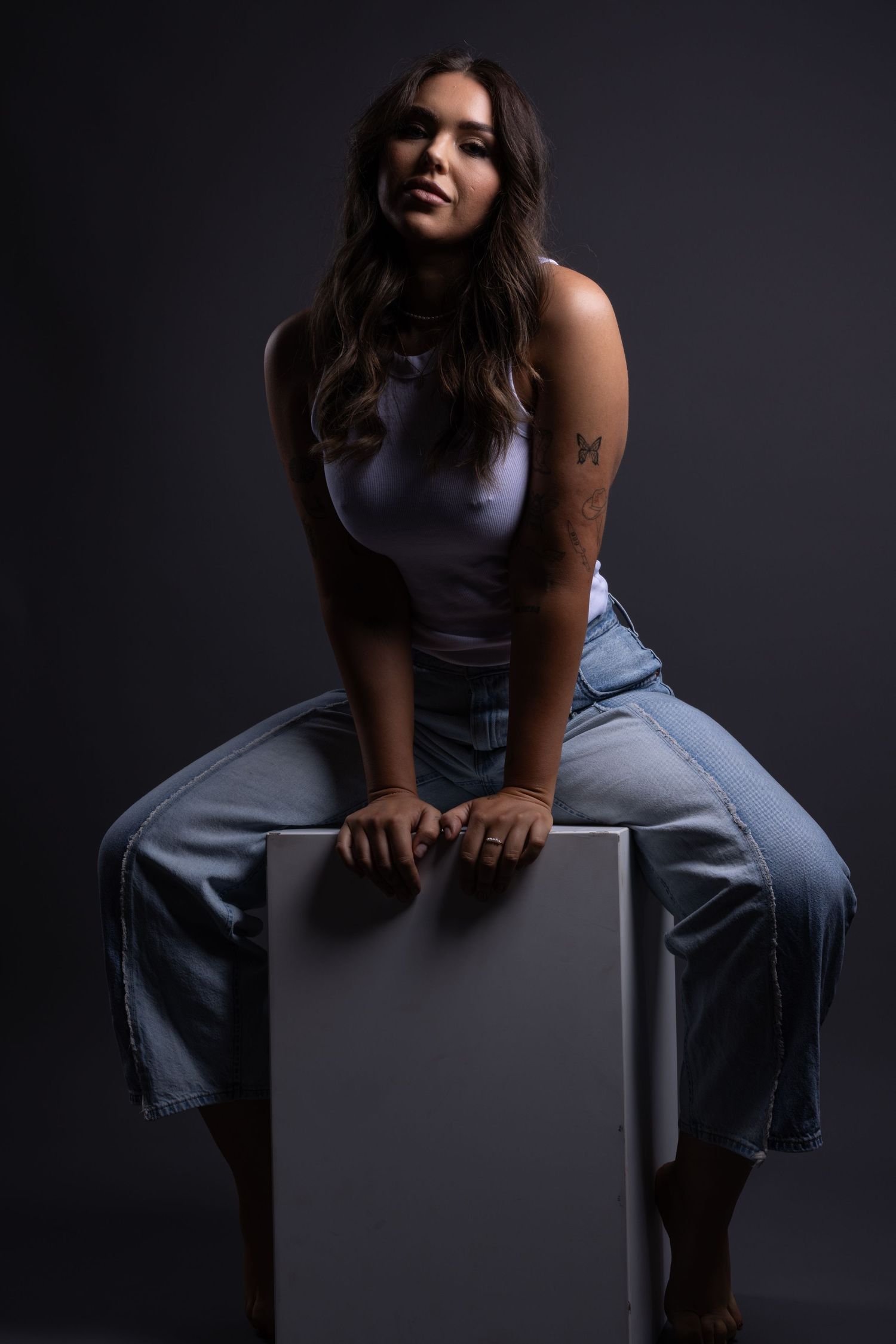 Creative studio portrait photography session in Darwin featuring dramatic lighting captured by Julie Françoise Imagery