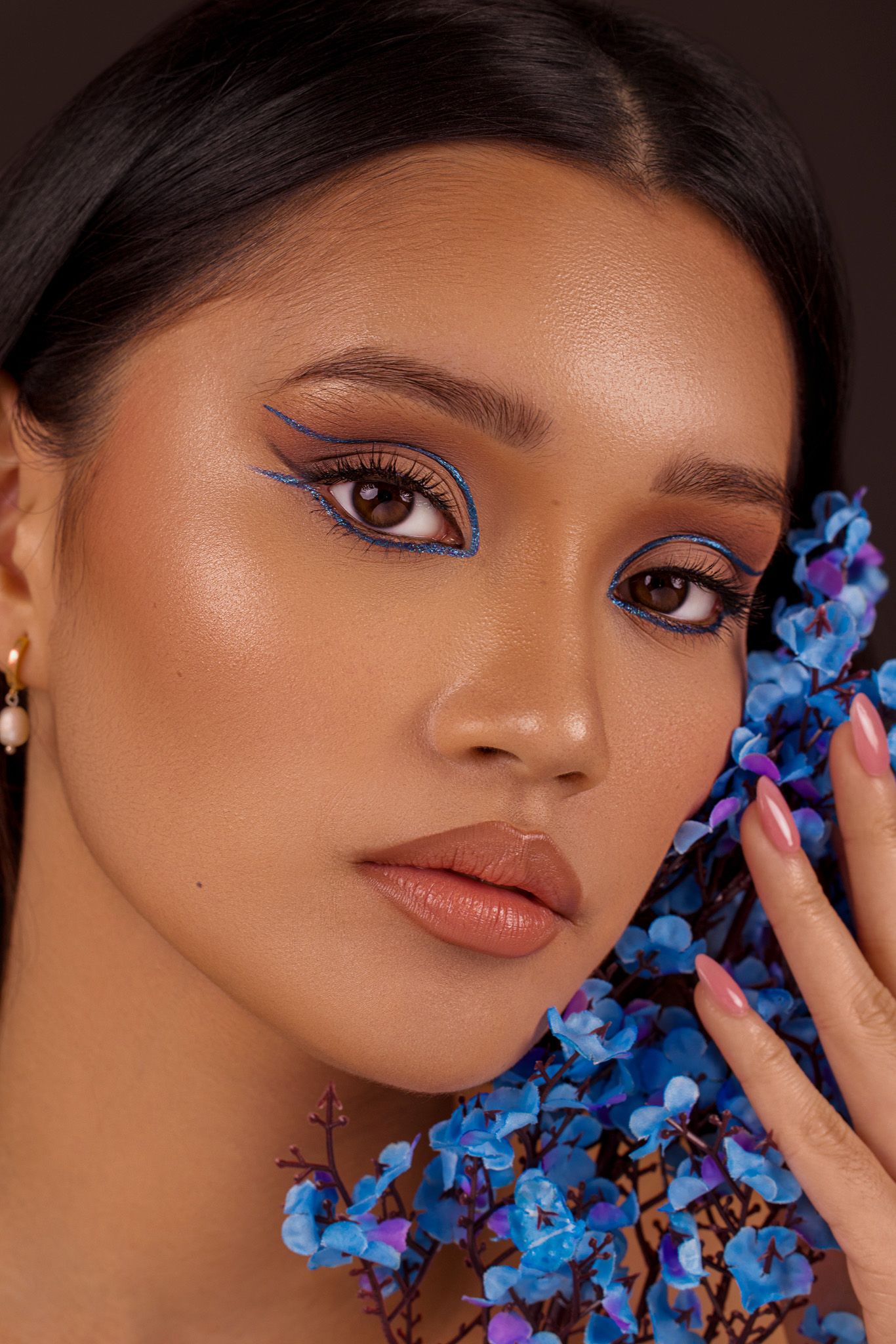 Close-up beauty portrait photography session in Darwin studio featuring professional lighting captured by Julie Françoise Imagery