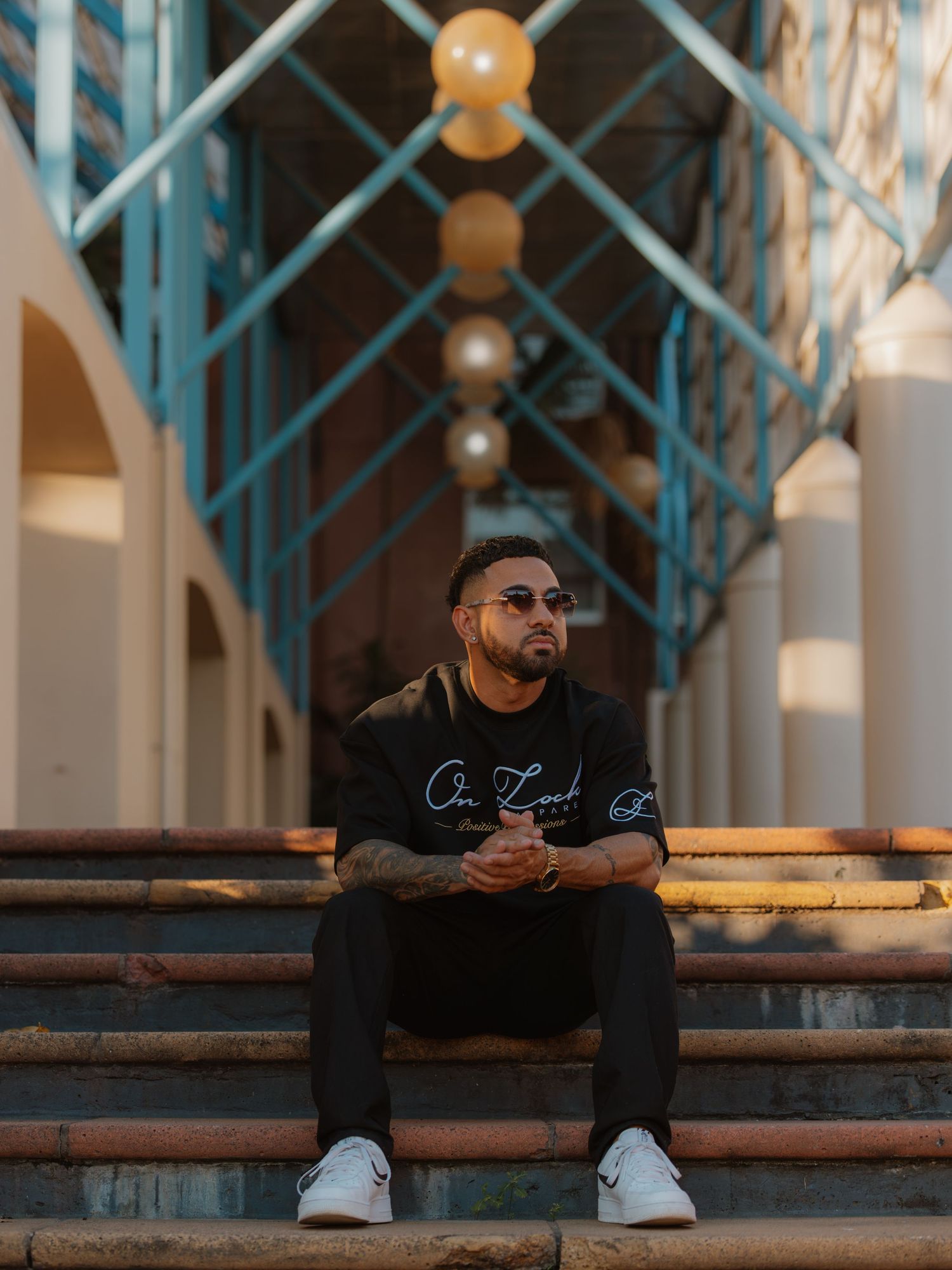 Urban portrait photography session in Darwin featuring architectural background styling captured by Julie Françoise Imagery