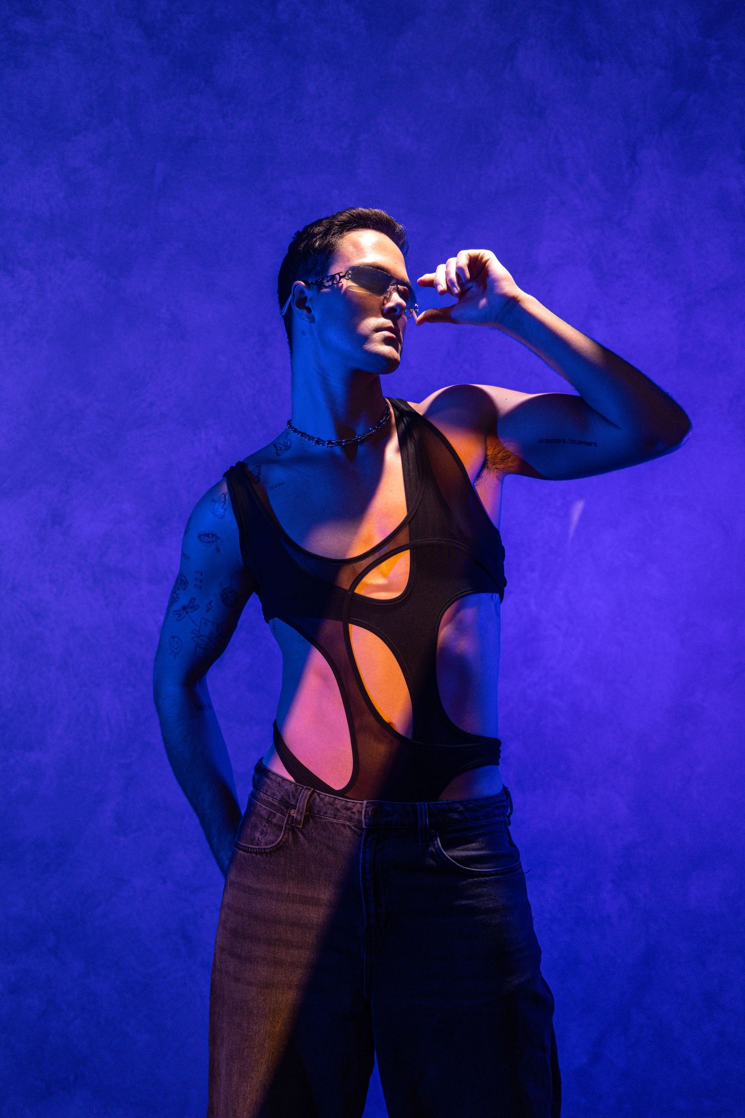 Creative fashion portrait photography session in Darwin studio featuring coloured editorial lighting captured by Julie Françoise Imagery
