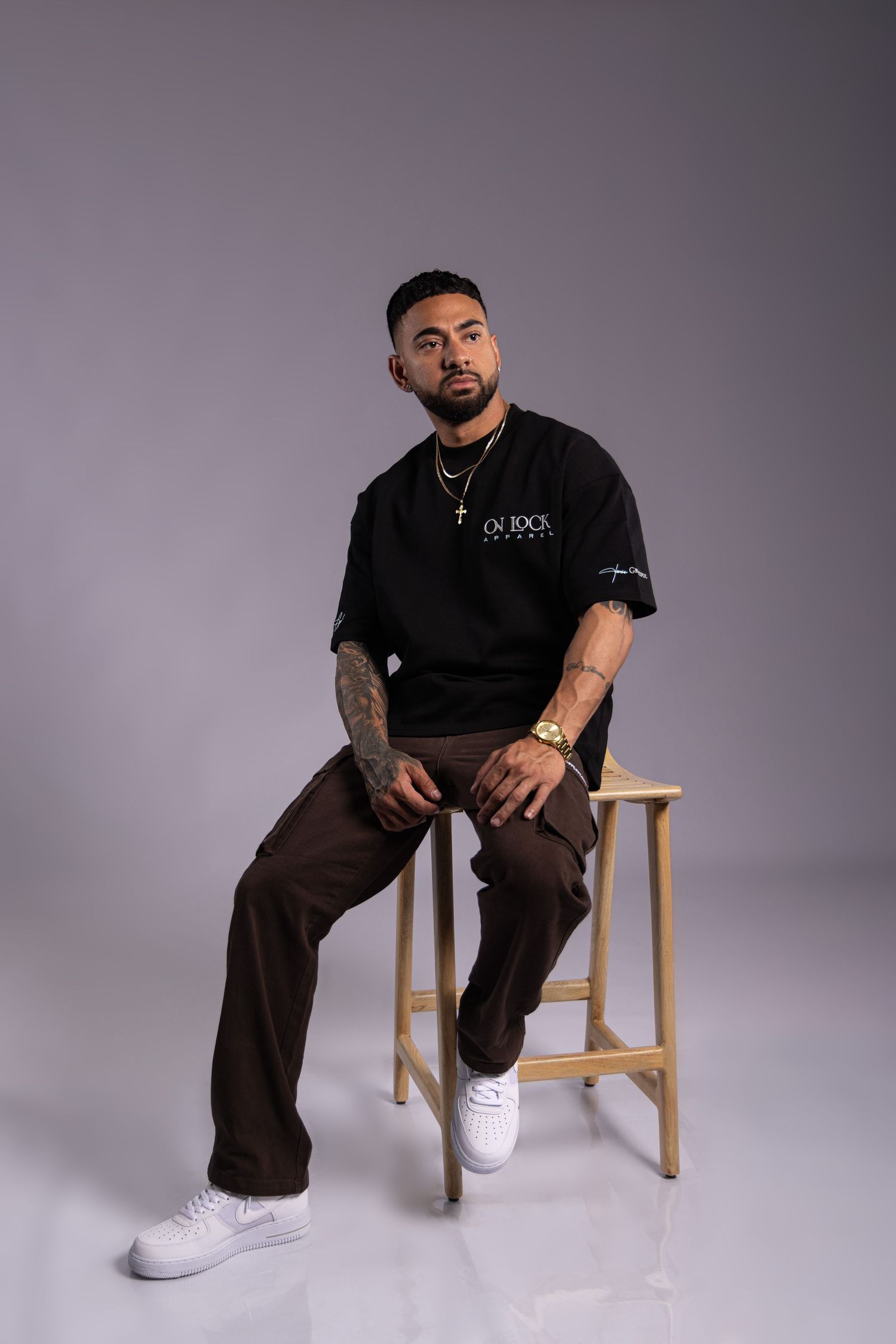 Professional male portrait photography session in Darwin studio featuring clean editorial lighting captured by Julie Françoise Imagery