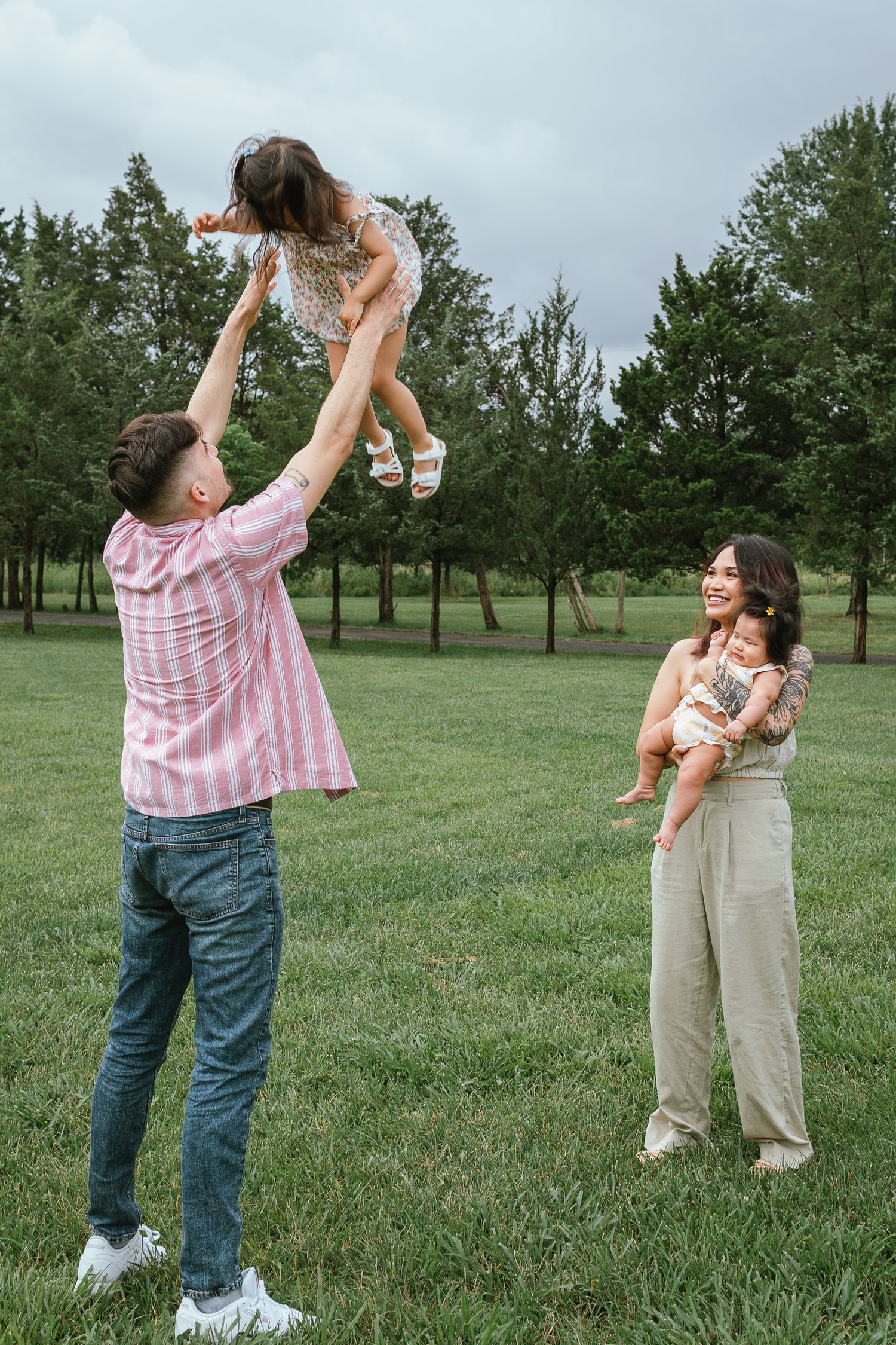 Candid sequence of a family playing together in a park setting.