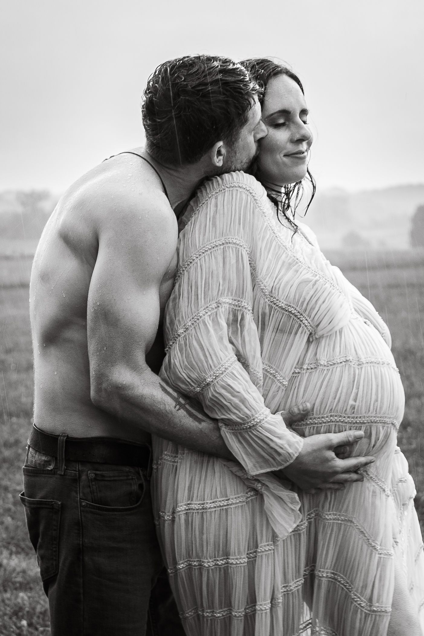 A series of intimate black and white photographs showing a couple embracing in a natural outdoor setting at different angles.