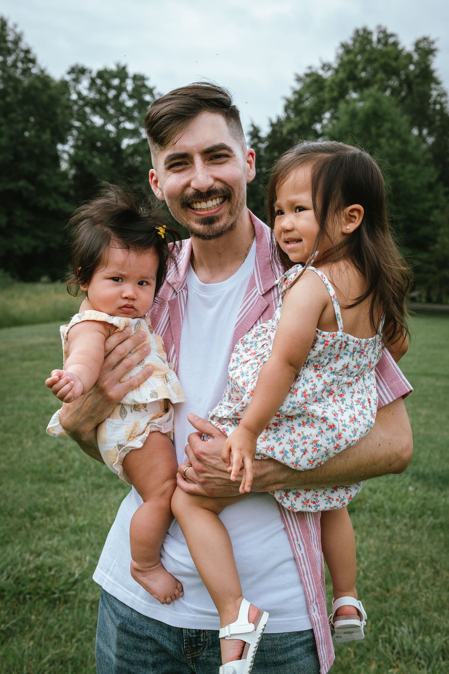 Happy family moment captured in sequence outdoors wearing casual summer attire.