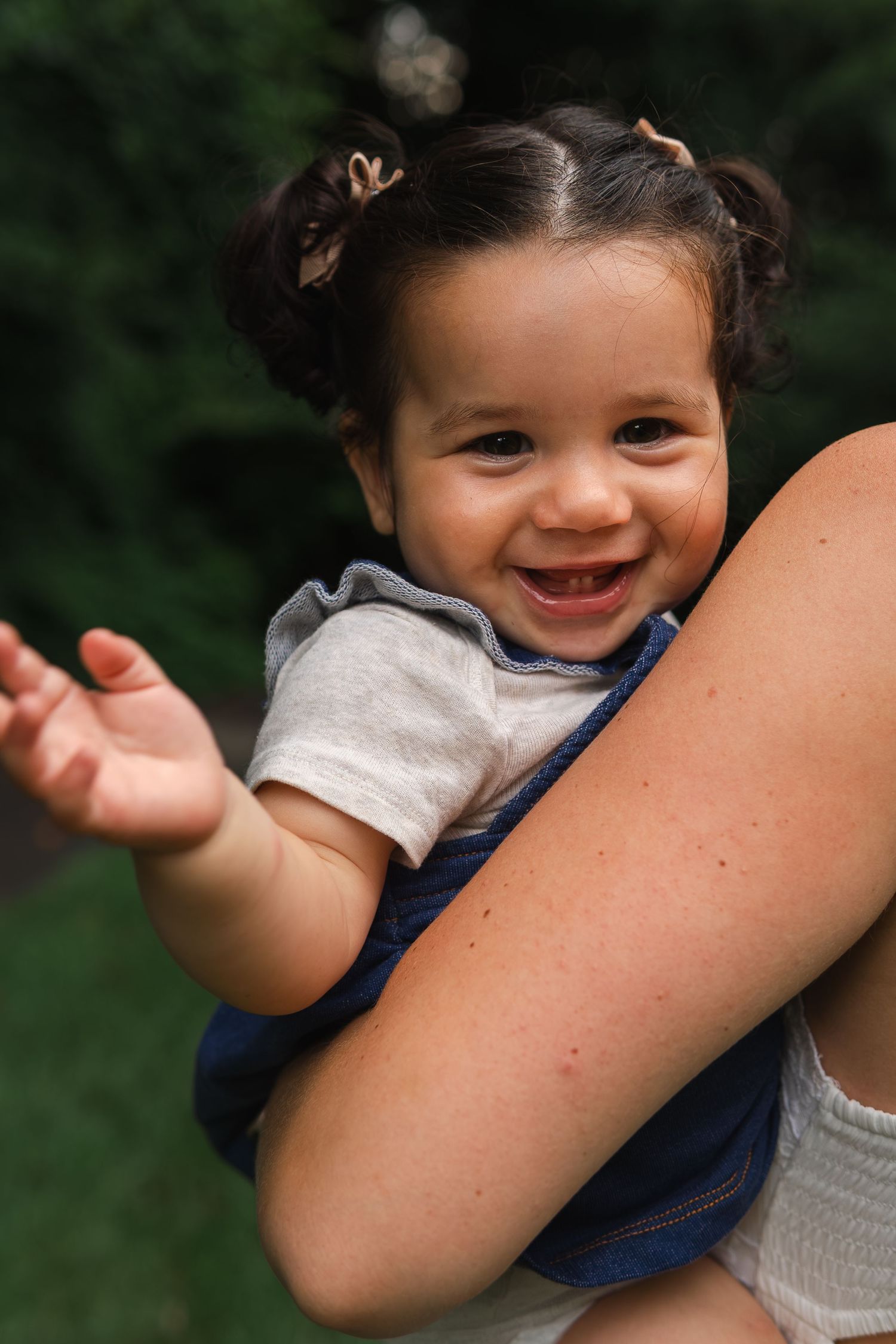 A close-up sequence shows joyful, candid moments between people embracing outdoors.