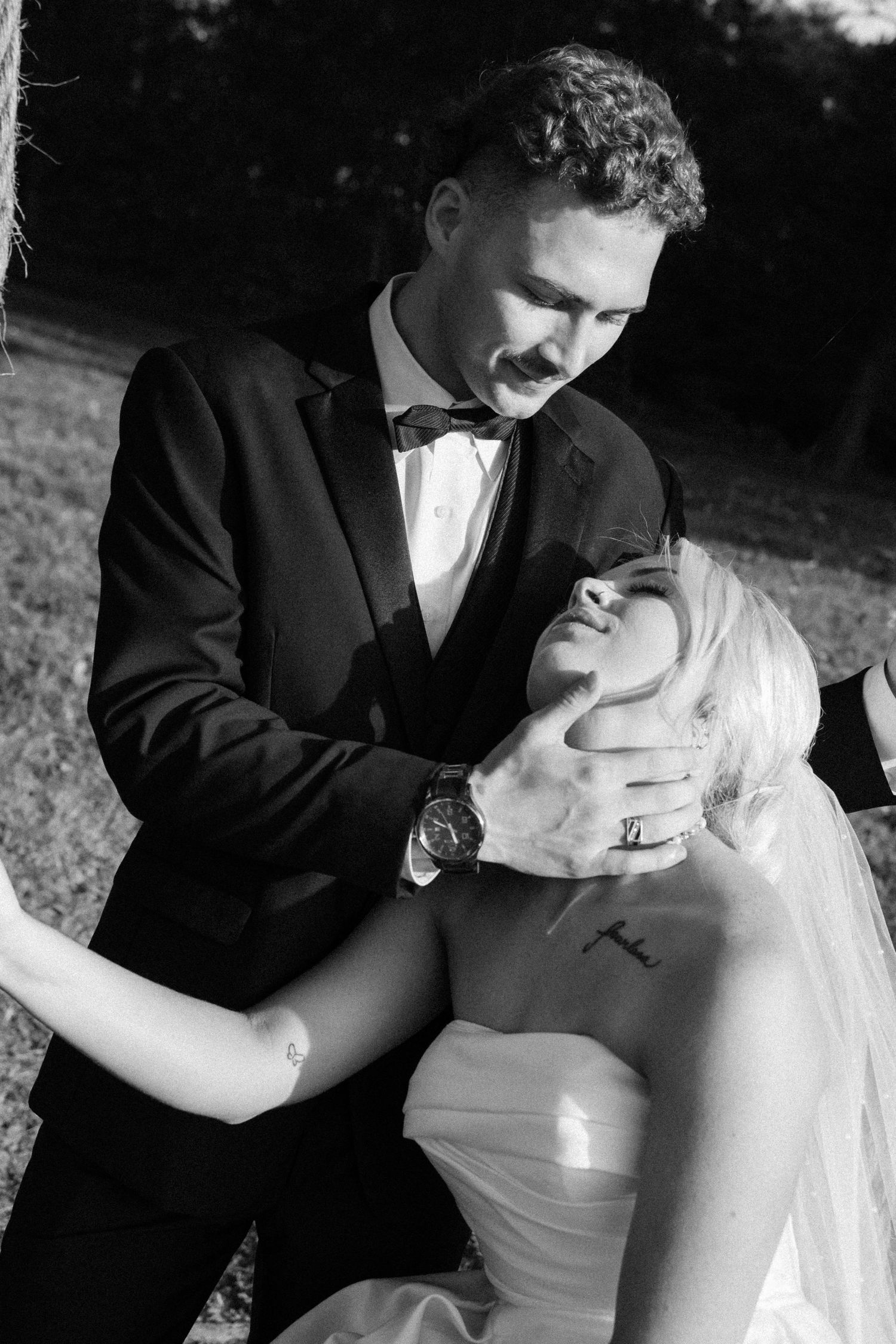 Black and white series of romantic wedding couple portraits showing tender moments.