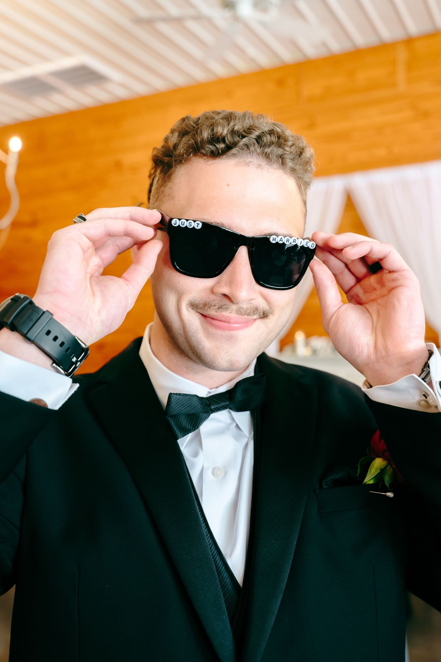 Groomsman putting on sunglasses in sequence of casual getting ready photos.