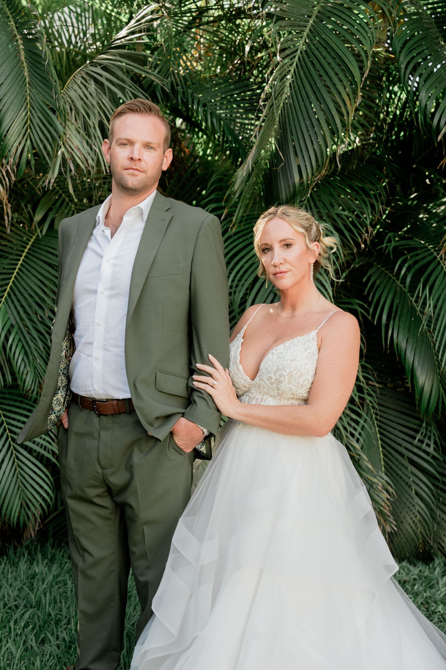 Editorial portrait of bride and groom in Aluxes, Isla Mujeres