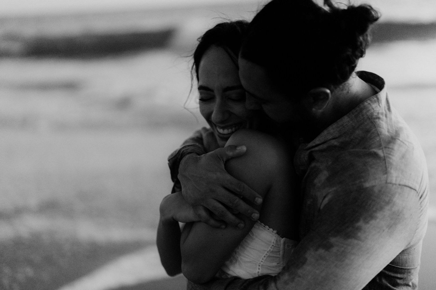 Intimate bride and groom photo holding each other close in Mazunte, Oaxaca