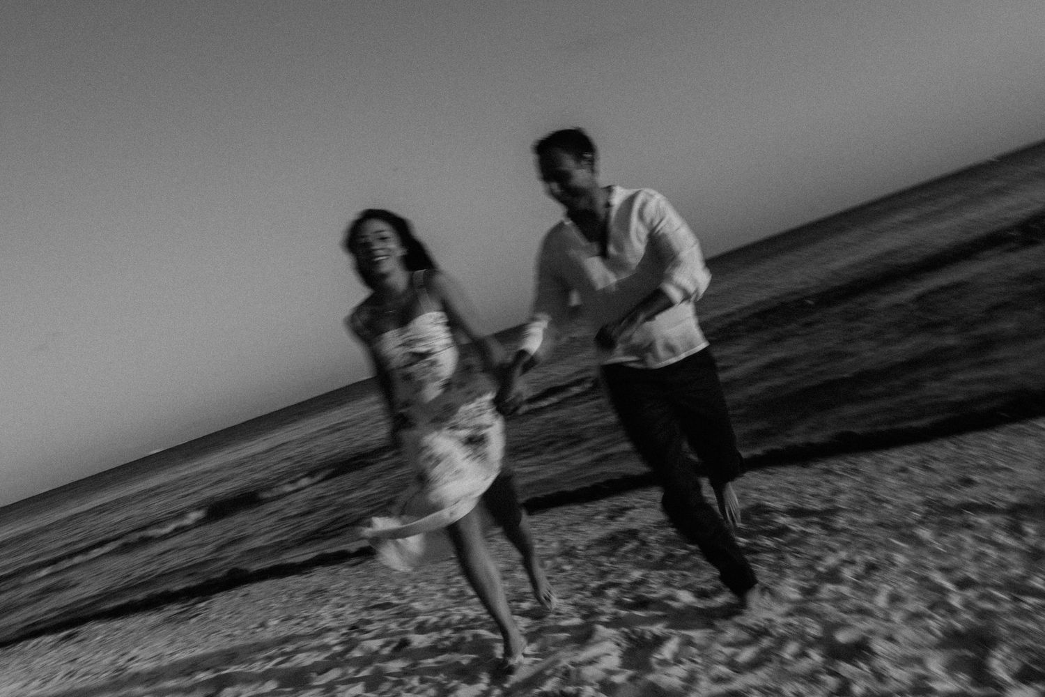 Couple running in the beach, Playa del carmen Mexico