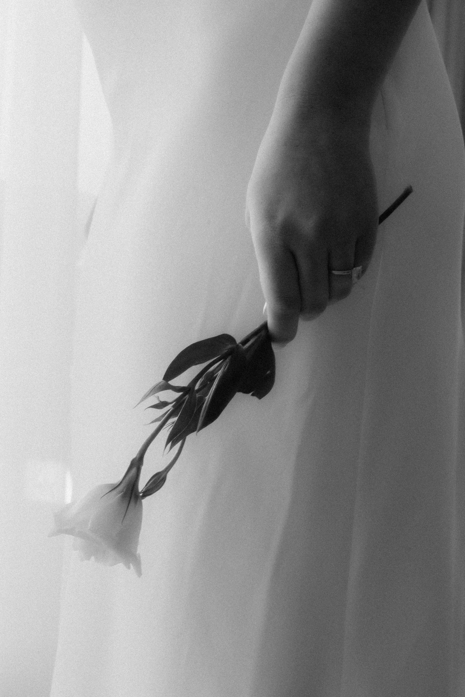 bridal detail flower in hand