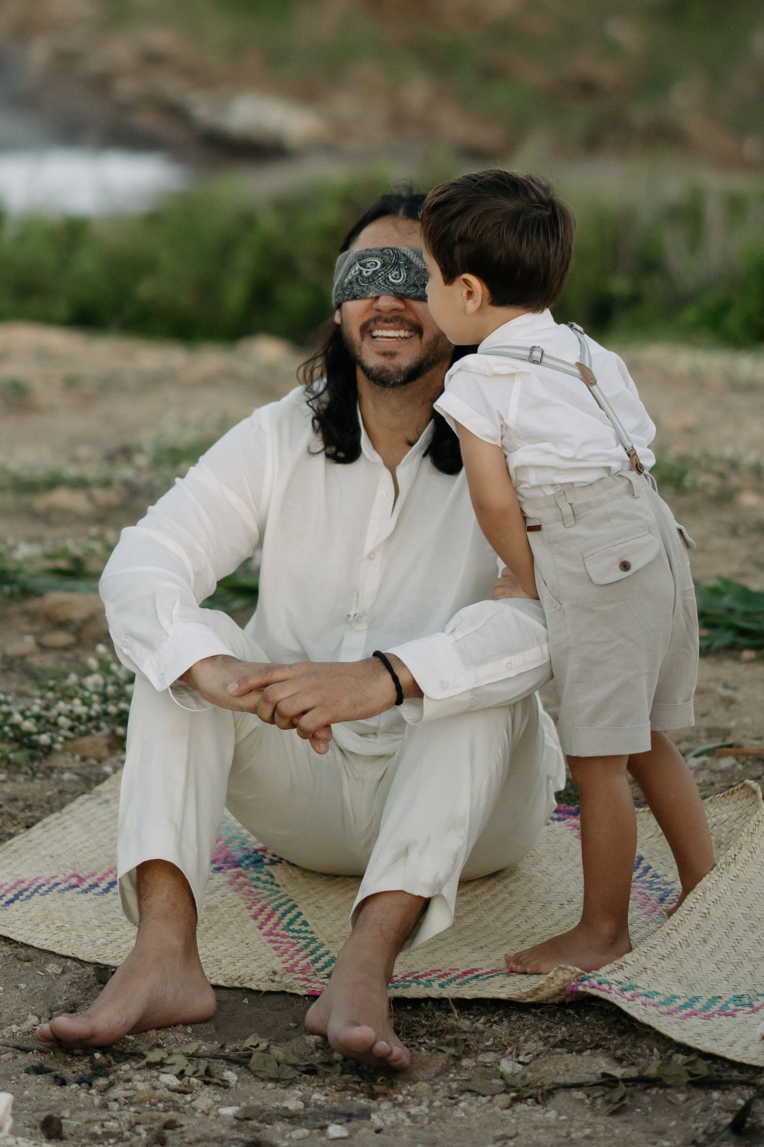 Groom about to see his bride accompanied by his son in Punta Cometa, Oaxaca elopement.