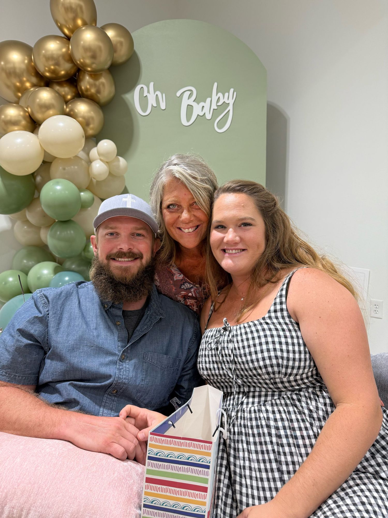 Baby shower party setting with decorative balloons and festive atmosphere.
