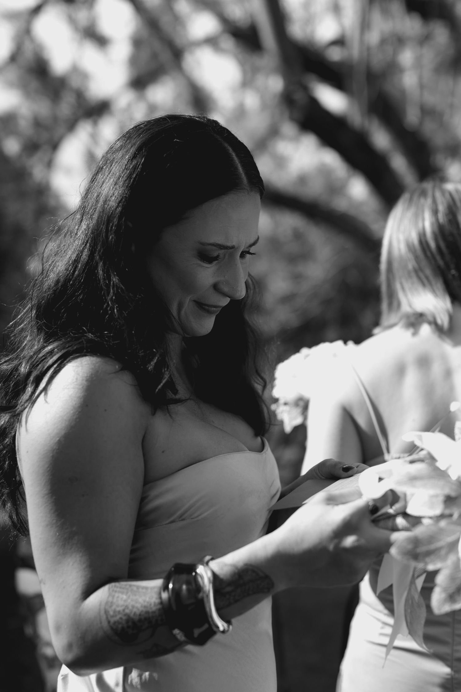 Black and white photos capturing candid reactions during wedding festivities.