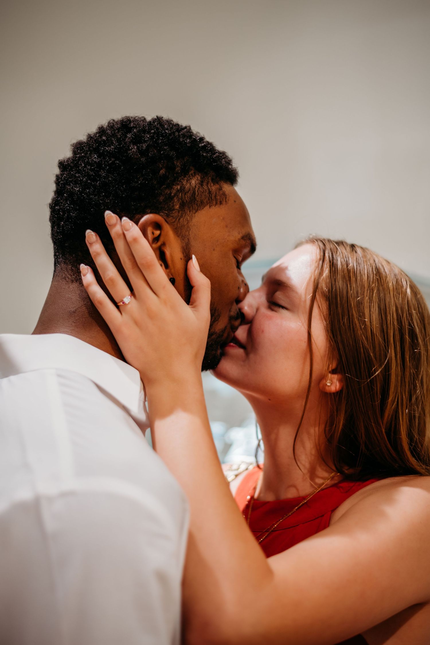 Intimate close-up portrait showing tender emotional moment.