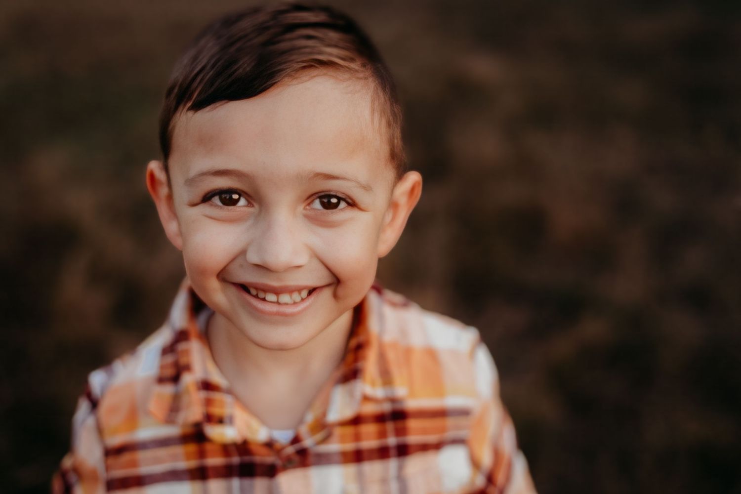 Close-up outdoor portrait series showing expressions of joy and playfulness.