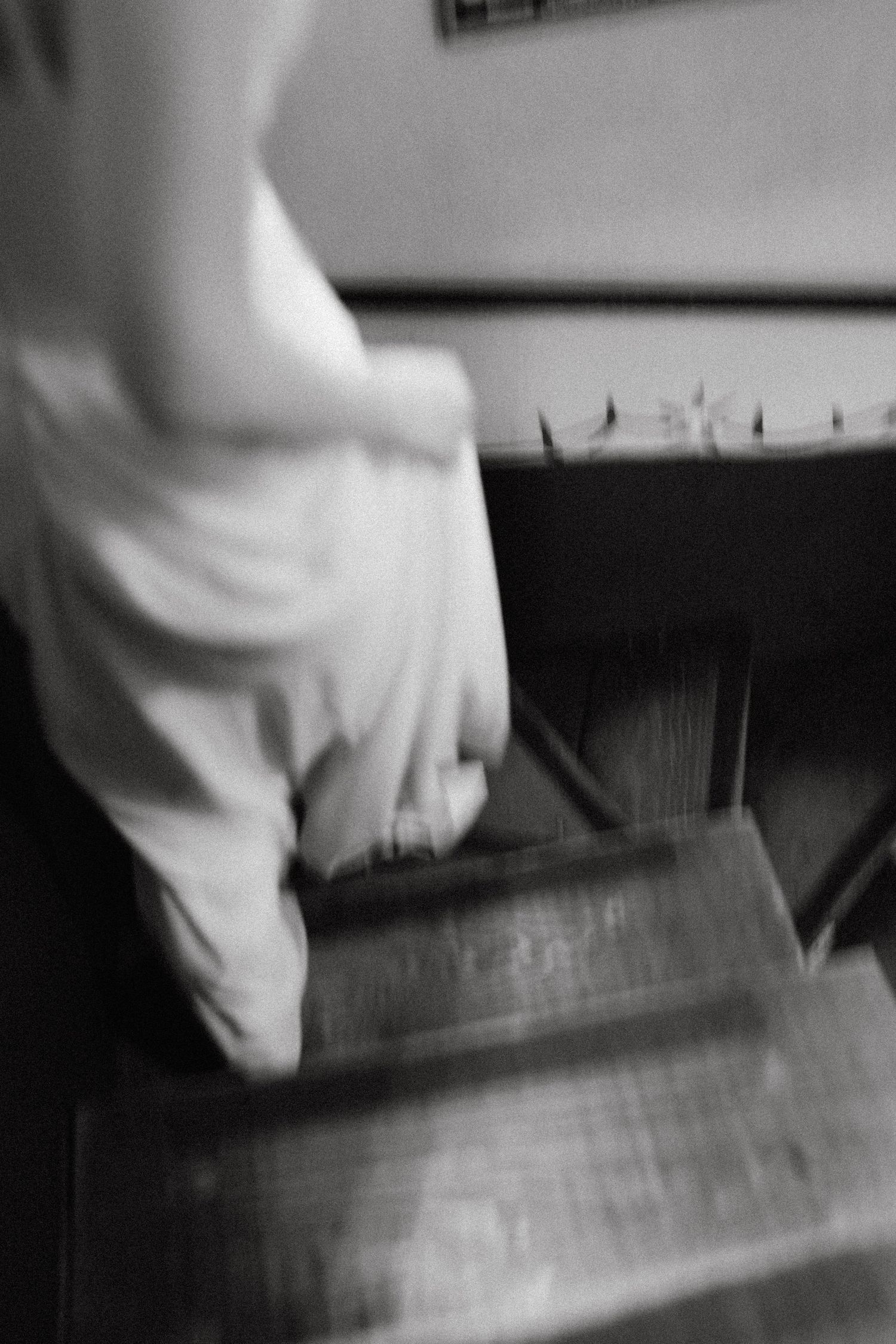 Abstract black and white motion shots creating artistic wedding dress effects.
