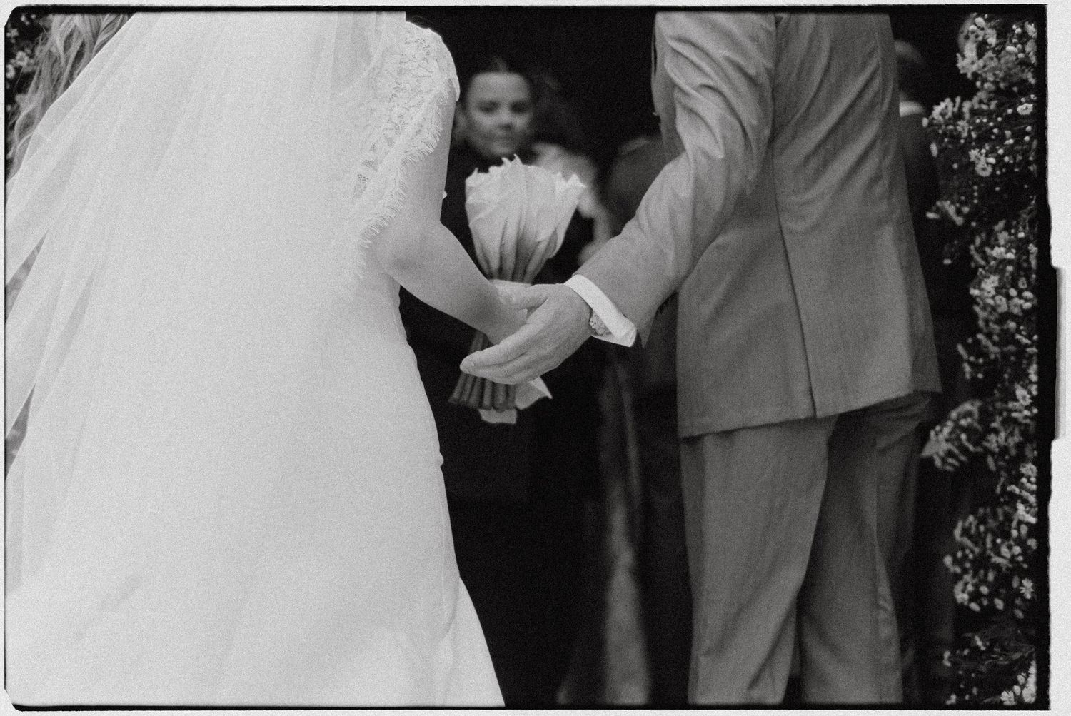 Black and white romantic wedding ceremony moments captured in sequence.
