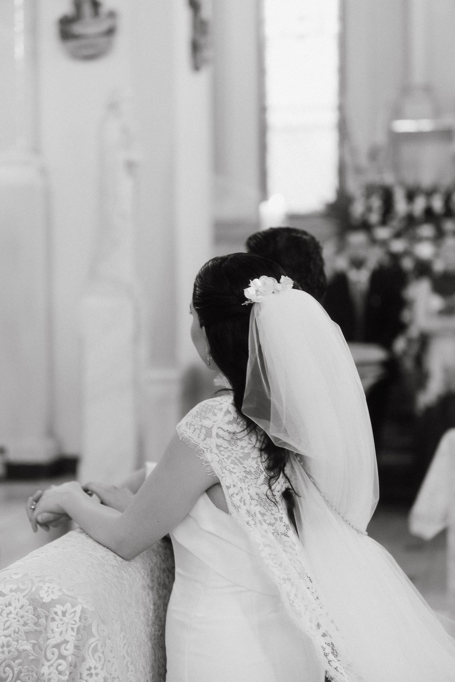 Elegant lace wedding veil details shown in a series of close-up shots.
