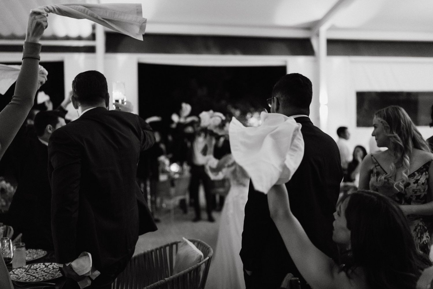 Dark atmospheric dance party scene with silhouettes and dramatic lighting.