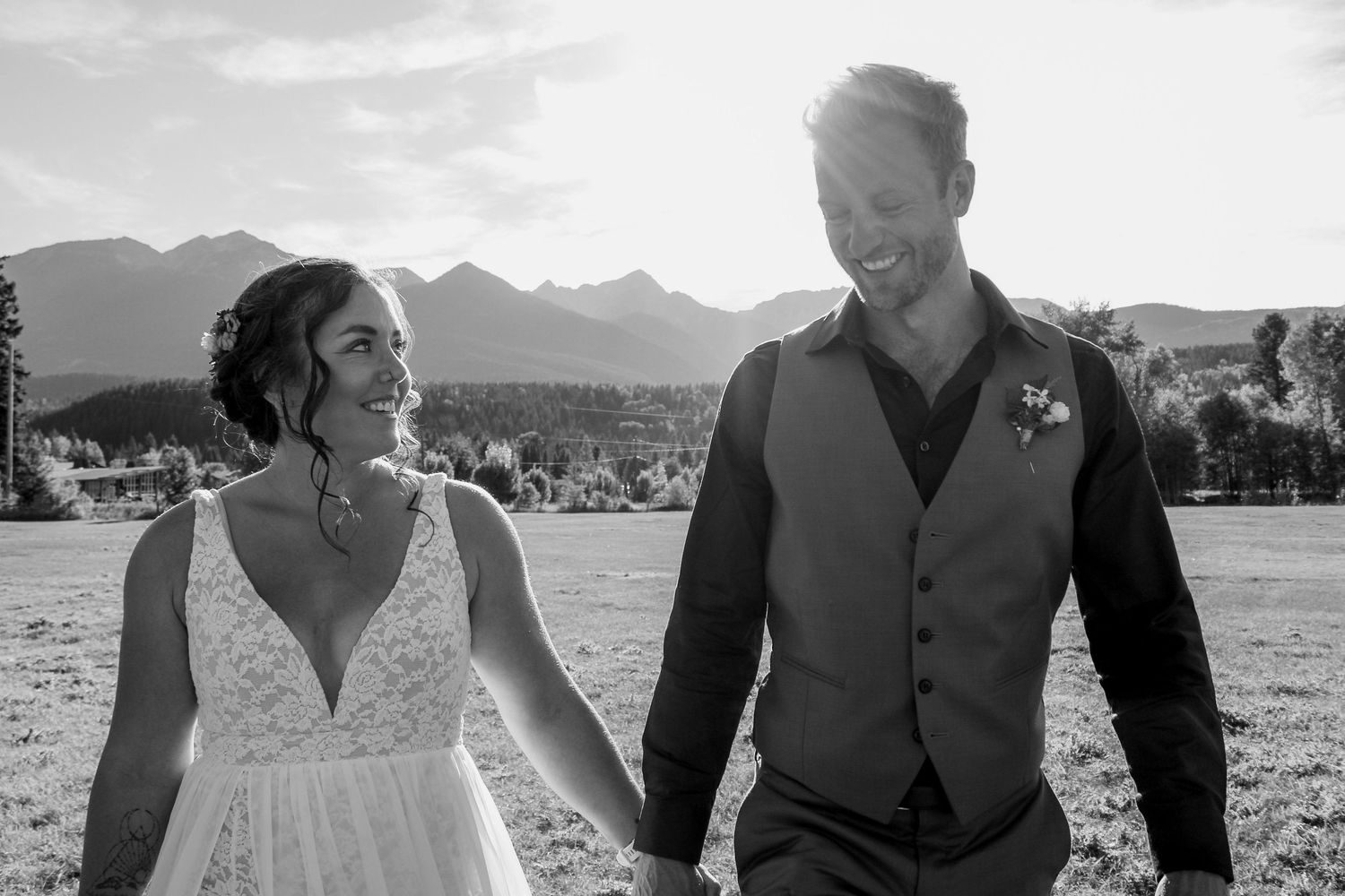 A series of wedding photos showing a couple embracing with mountains and a lake in the background.