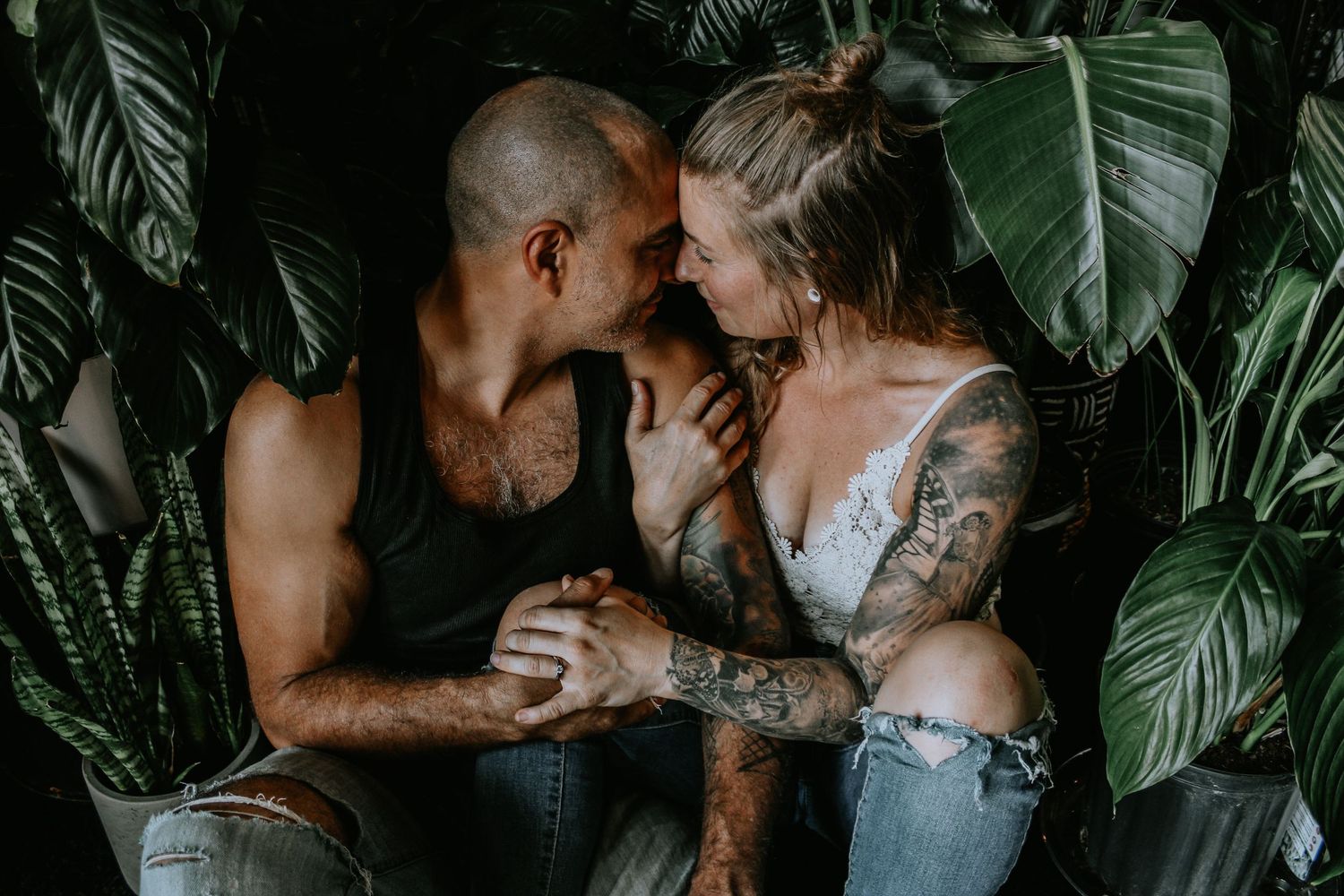 Romantic lifestyle photoshoot in a modern interior with tropical plant decor.