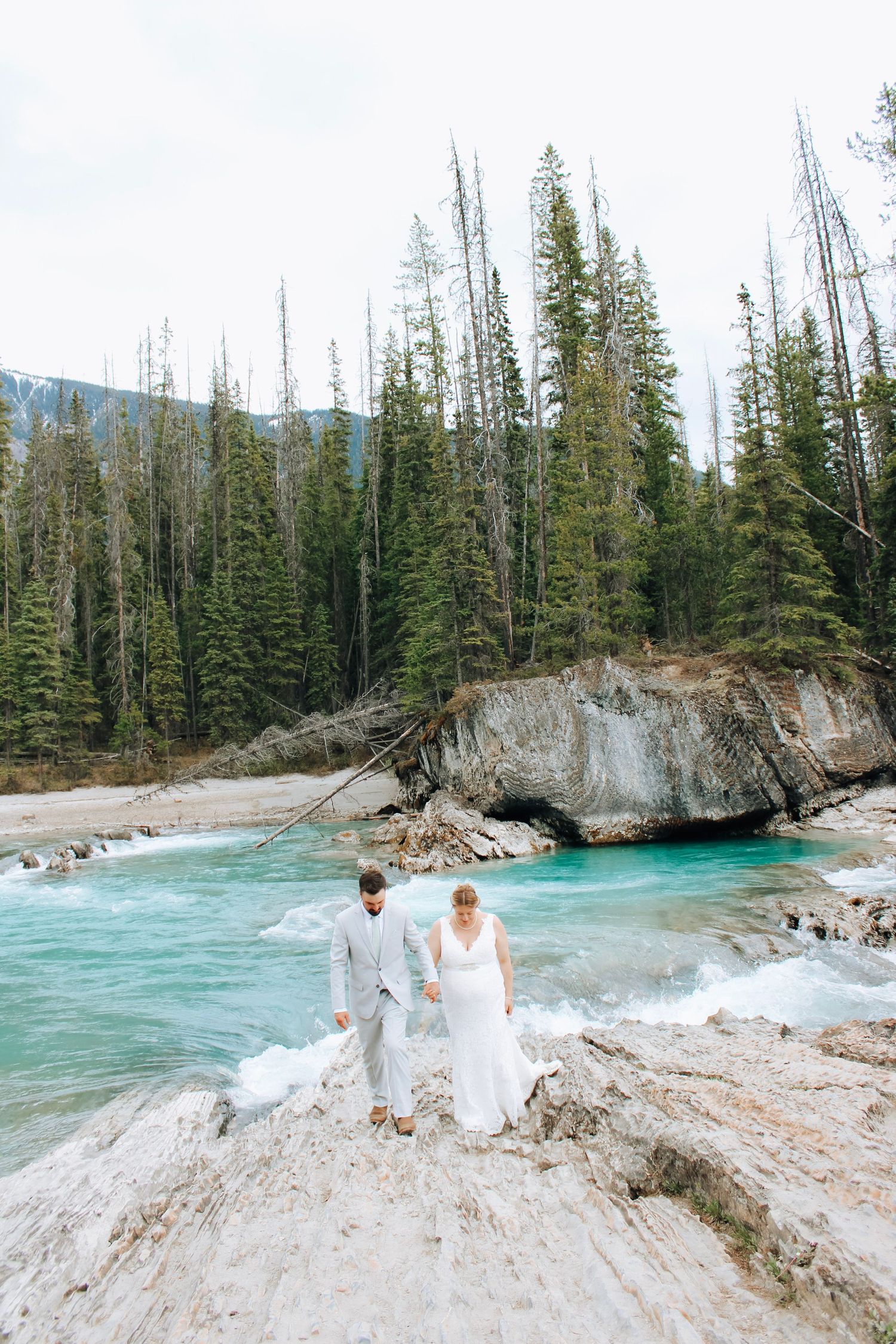 Beautiful mountain river scene with white rocky outcrops and emerald waters.