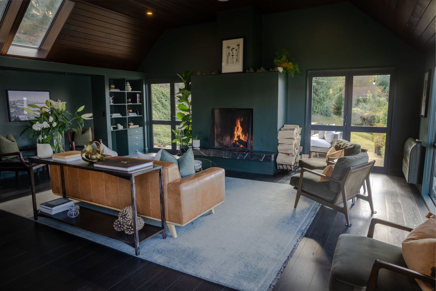 Cozy Lounge / library area with fire going. A space to relax and enjoy the views.