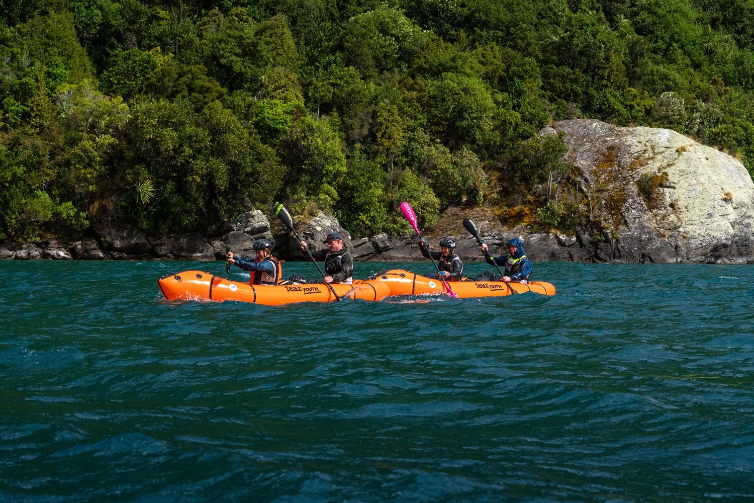 Pakrafters paddling on lake Wakatipu for The Magnificent Adventure Race.