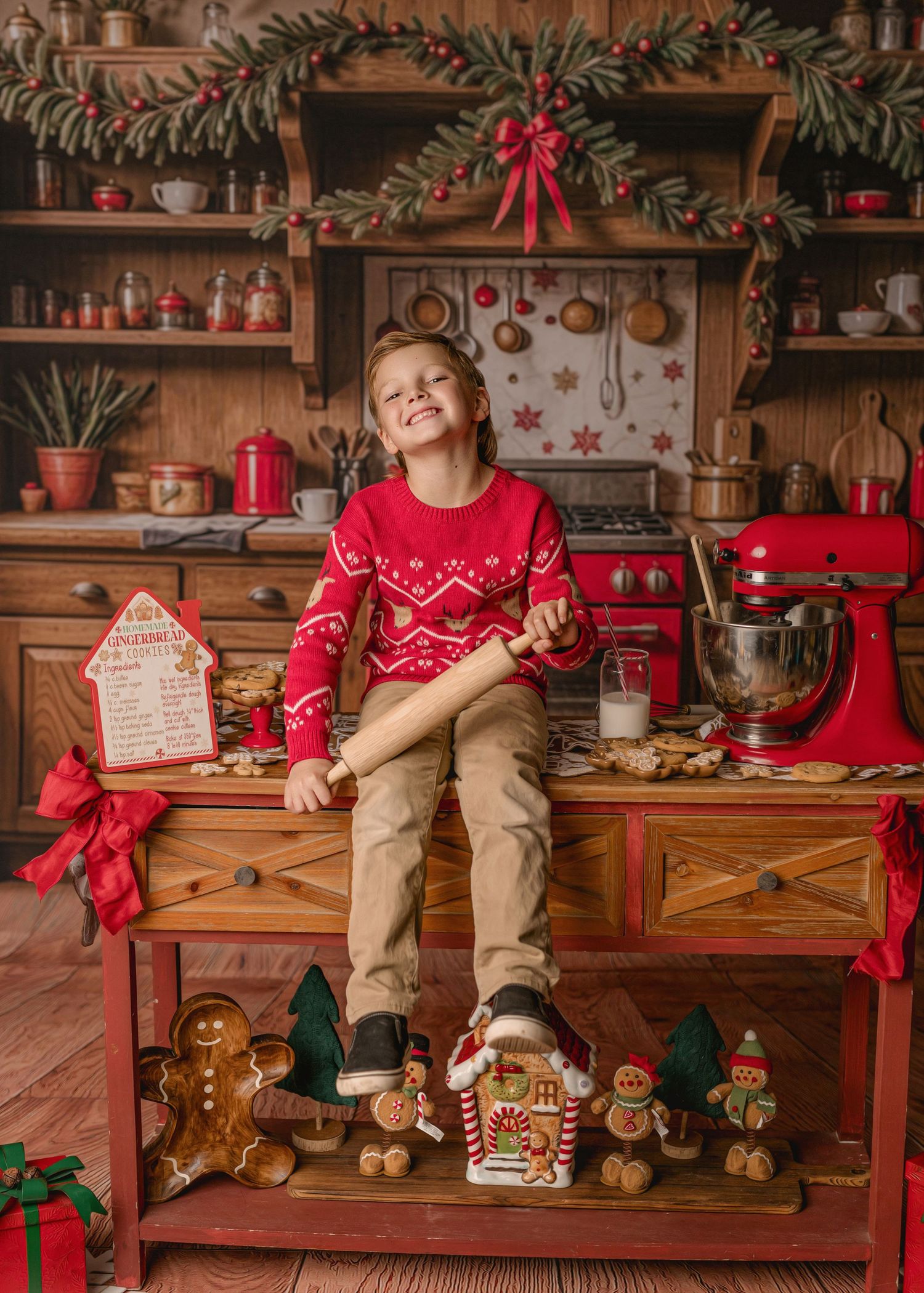 A festive Christmas scene with a wooden bench decorated with gingerbread figures, evergreen garlands and red accents.