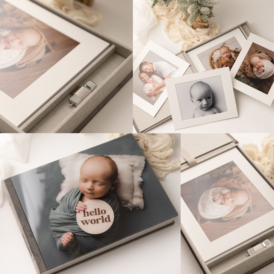 Elegant newborn photography keepsake box set with printed photos, USB drive, and hello world album in neutral tones.