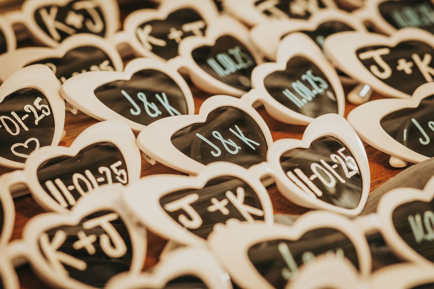 Elegant black and white cookies with custom text arranged in a repeating pattern.